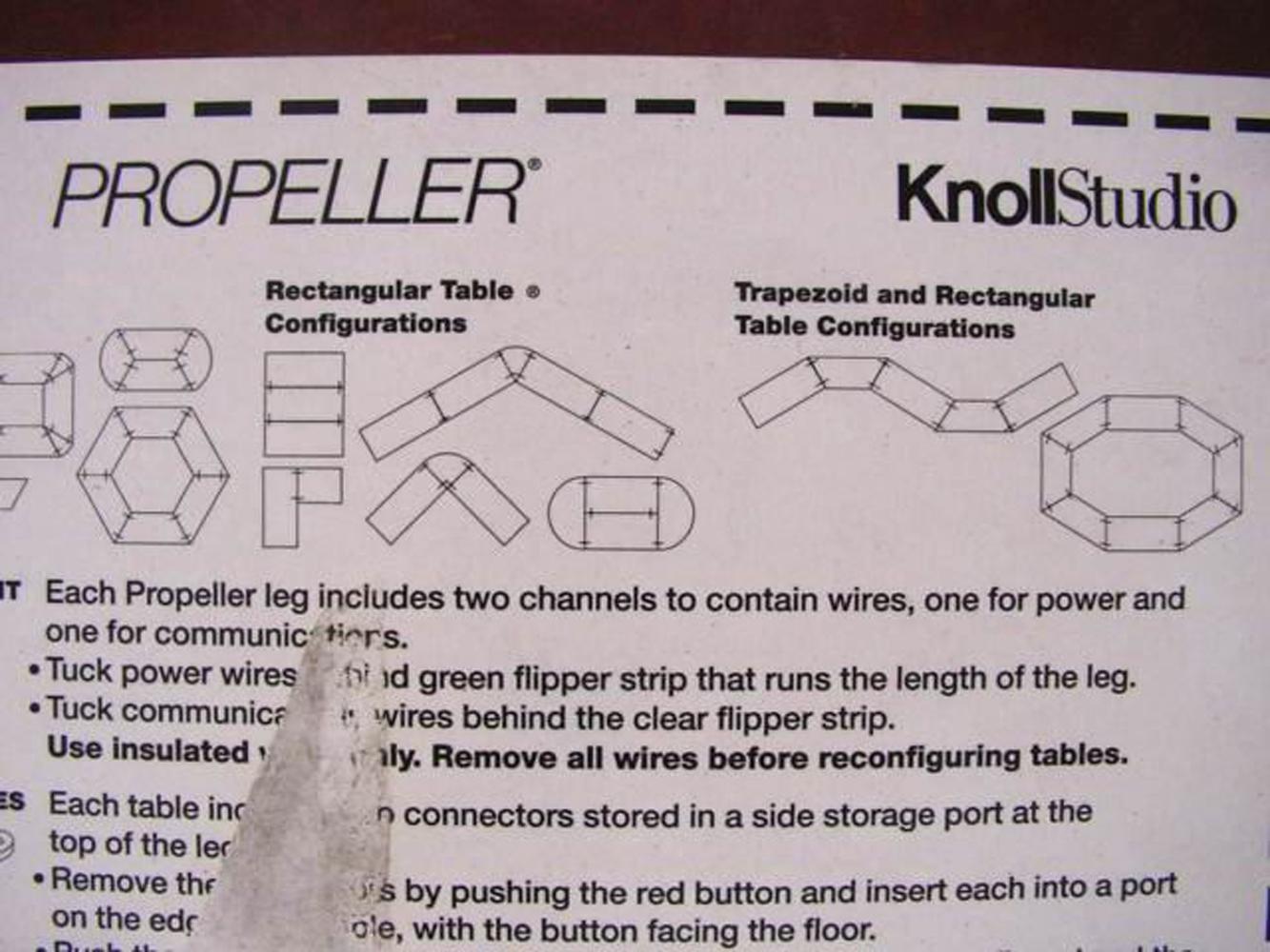 Vintage Knoll Propeller modular table.
This version has a wood veneer top a with a rubber edge.
A diagram underneath the table shows the various ways these tables can be arranged.
 
 66