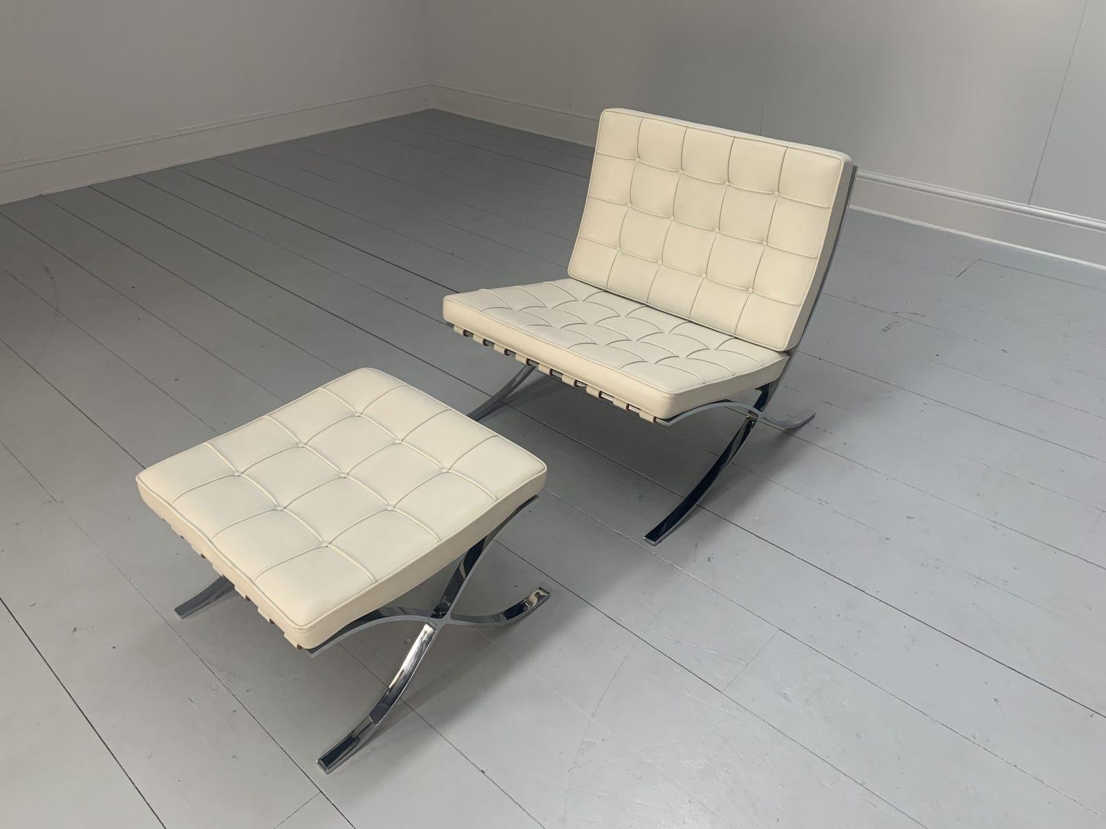 This is a rare, original “Barcelona” Lounge Chair and Ottoman Suite from the world renown furniture house of Knoll Studio, dressed in the most sublime, tactile Pale-Ivory Leather, and with Polished Chrome framework.

In a world of temporary