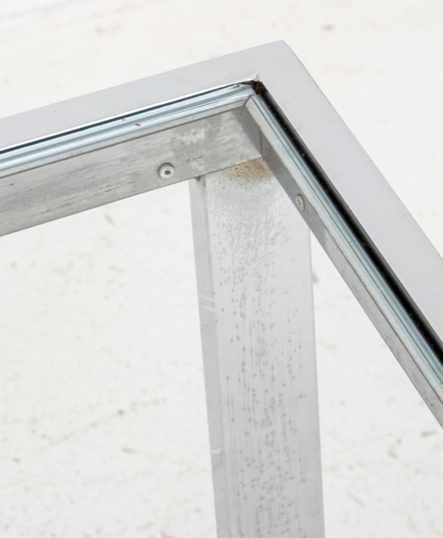 The dimensions for the Knoll Style Chrome and Glass Table are approximately:

Height: 28
