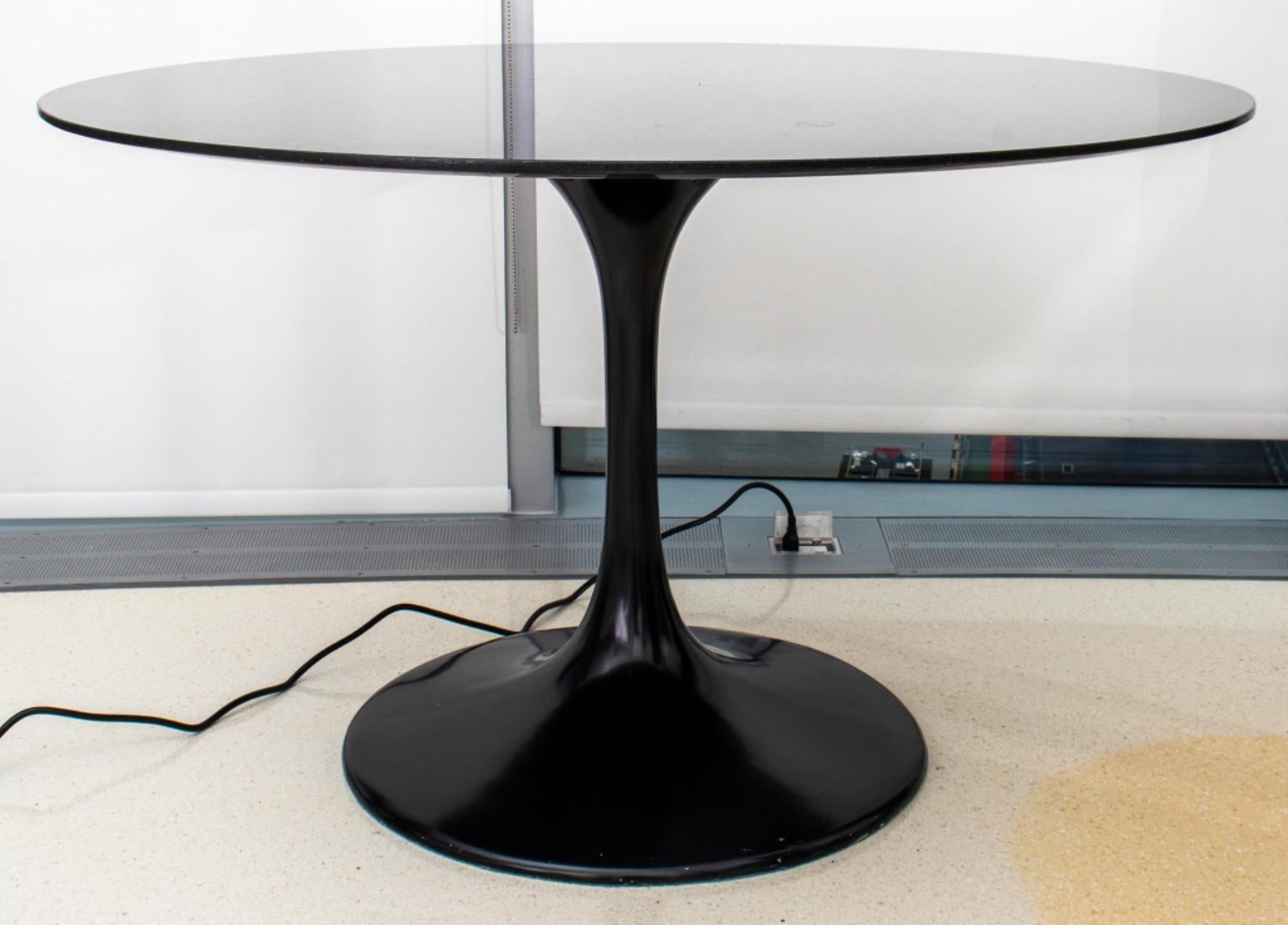 Knoll style circular tulip table in the manner of Eero Saarinen (Finnish, 1910-1961) with brnize granite tope on black columnar base.

Dimensions: 29