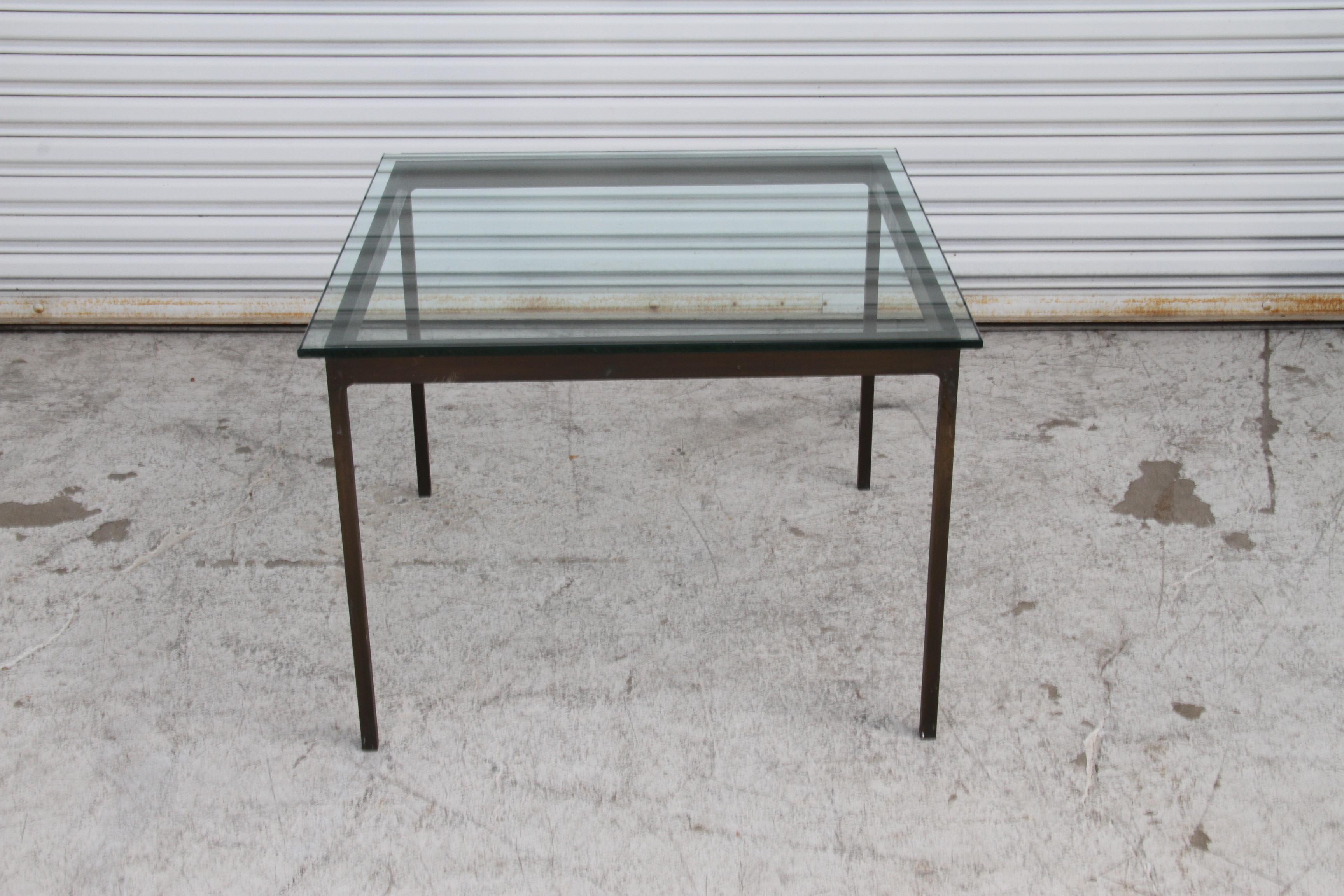 20ième siècle Nicos Zographos Table basse à base de bronze avec plateau en verre en vente