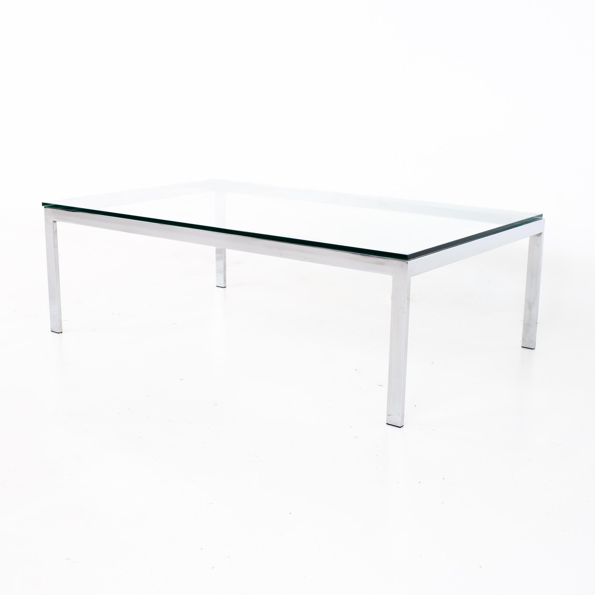 Knoll style mid century glass and chrome coffee table
Coffee table measures: 48 wide x 30 deep x 15 inches high

All pieces of furniture can be had in what we call restored vintage condition. That means the piece is restored upon purchase so it’s