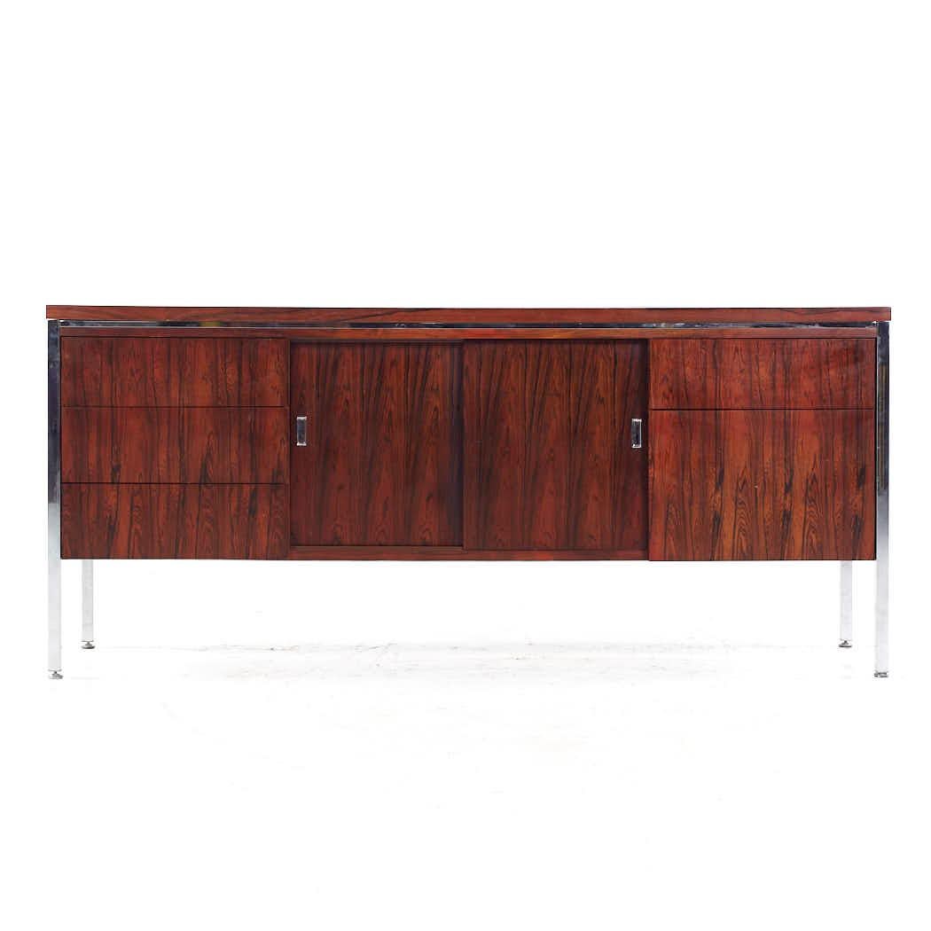 Knoll Style Mid Century Rosewood Credenza

This credenza measures: 66 wide x 18 deep x 29.25 inches high

All pieces of furniture can be had in what we call restored vintage condition. That means the piece is restored upon purchase so it’s free of