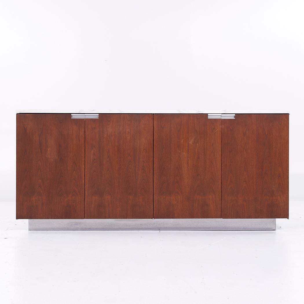 Knoll Style Mid Century Walnut and Carrara Marble Top Credenza

This credenza measures: 78 wide x 18 deep x 35 inches high

All pieces of furniture can be had in what we call restored vintage condition. That means the piece is restored upon purchase