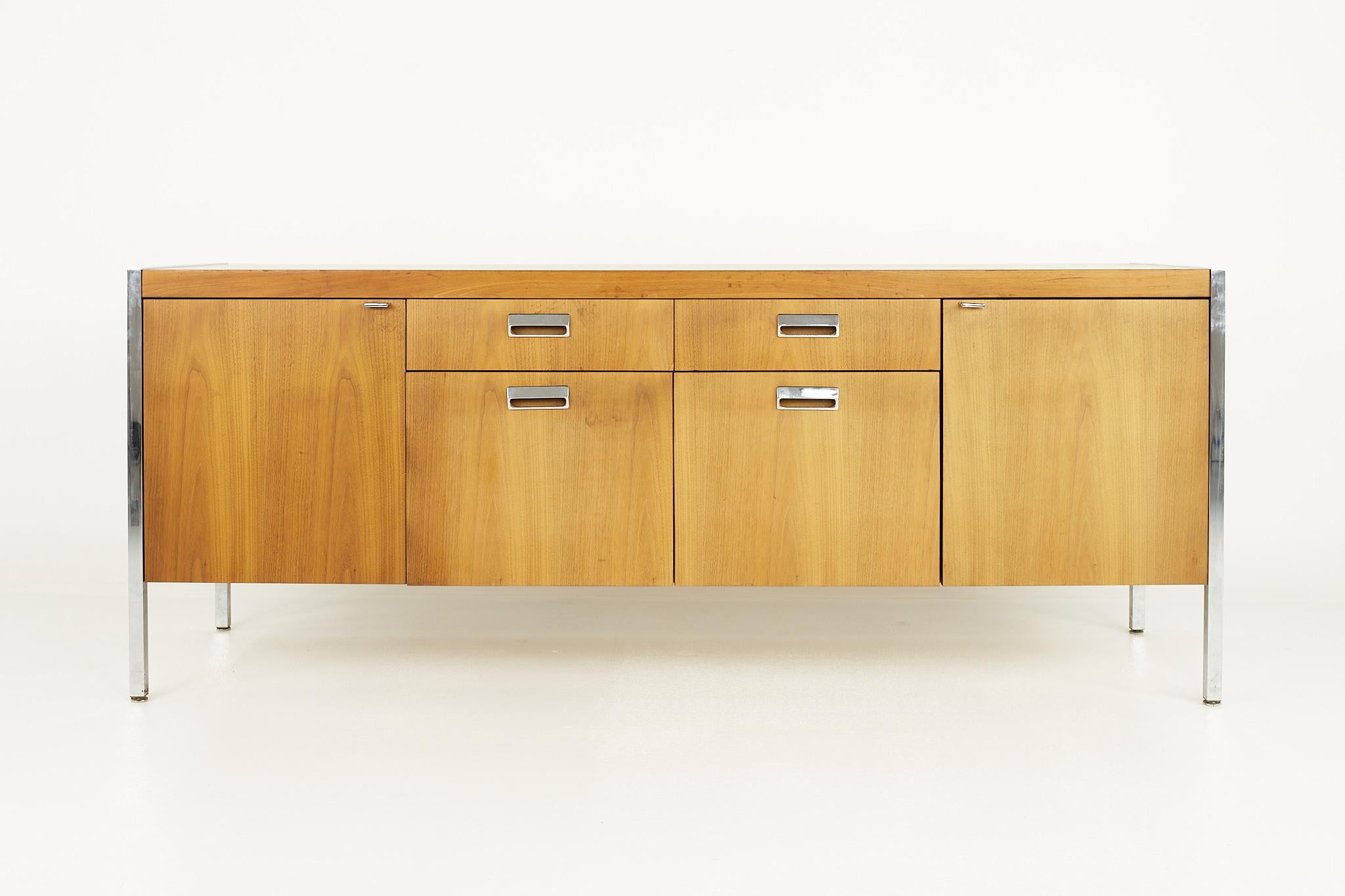 Knoll style mid century walnut and chrome office sideboard credenza

This credenza measures: 72.5 wide x 20 deep x 29.5 inches high

?All pieces of furniture can be had in what we call restored vintage condition. That means the piece is restored