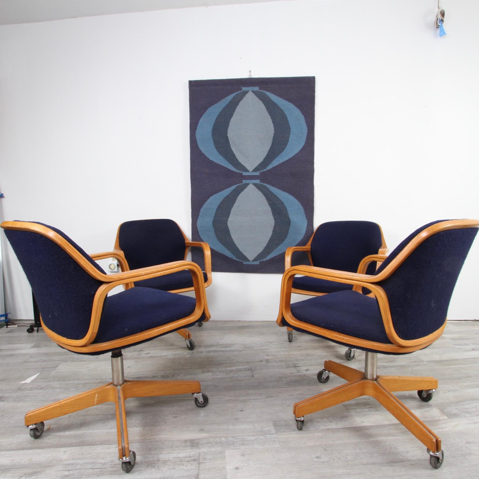 Offering four original Knoll International task arm chairs. Designed by Bill StephensBill Stephens started at Knoll as an assistant prototype builder after his graduation from the Philadelphia Museum School of Art. He first tried to make a cane