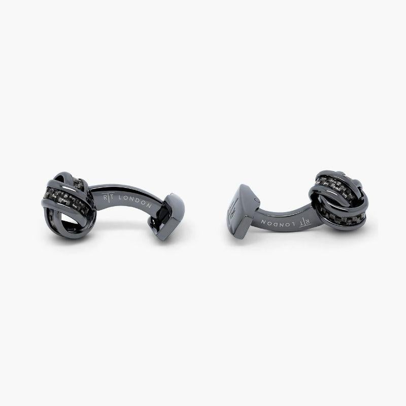 Knot Cufflinks with Black Carbon Fibre

Our iconic knot cufflinks are elevated with a contrasting material, using black carbon fibre, laid within the curves of the overlapping knot. Set in gunmetal plated base metal. Perfect for those who love a