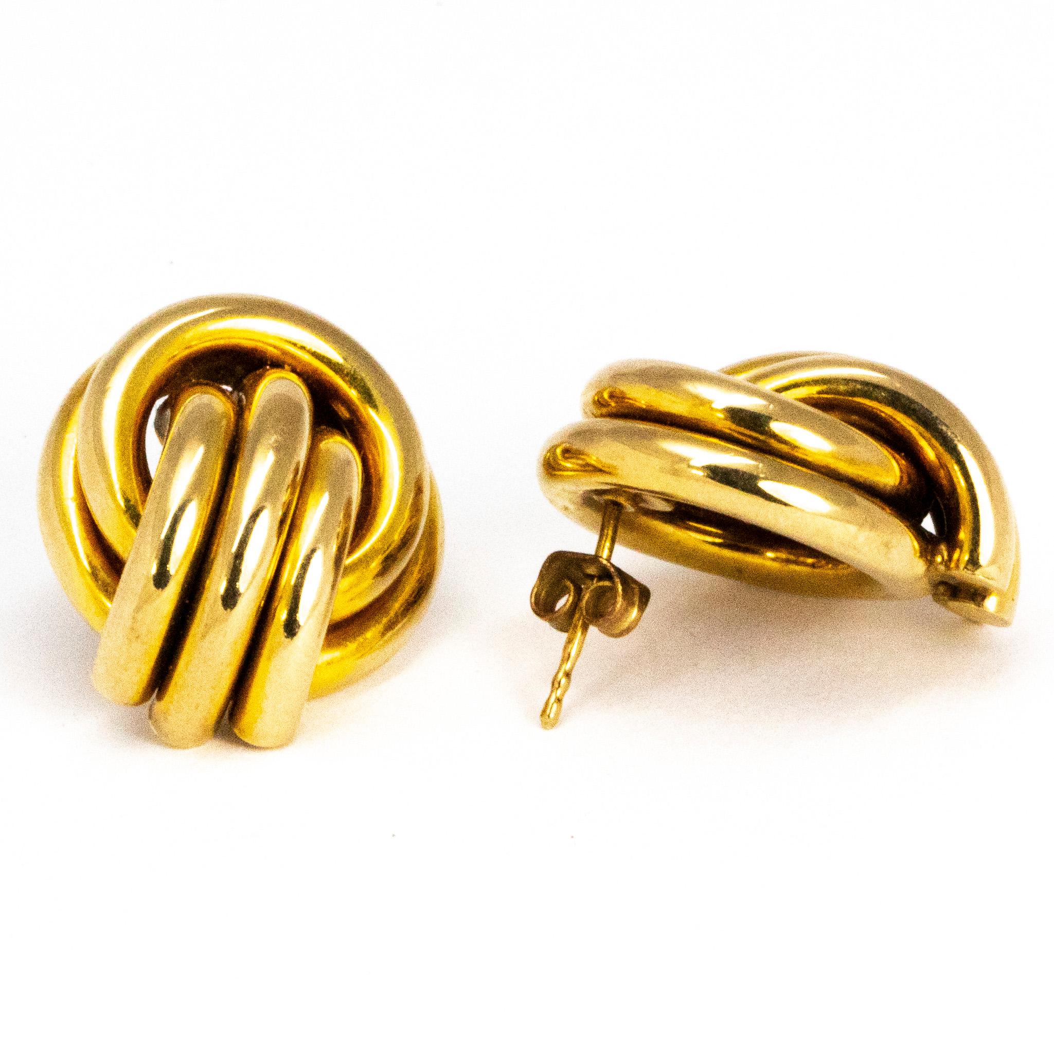 These classic knot style stud earrings are modelled out of 9ct gold. This pair of earrings are on the large side and and are fantastic statement jewellery. 

Earring Dimensions: 22mm x 19mm  