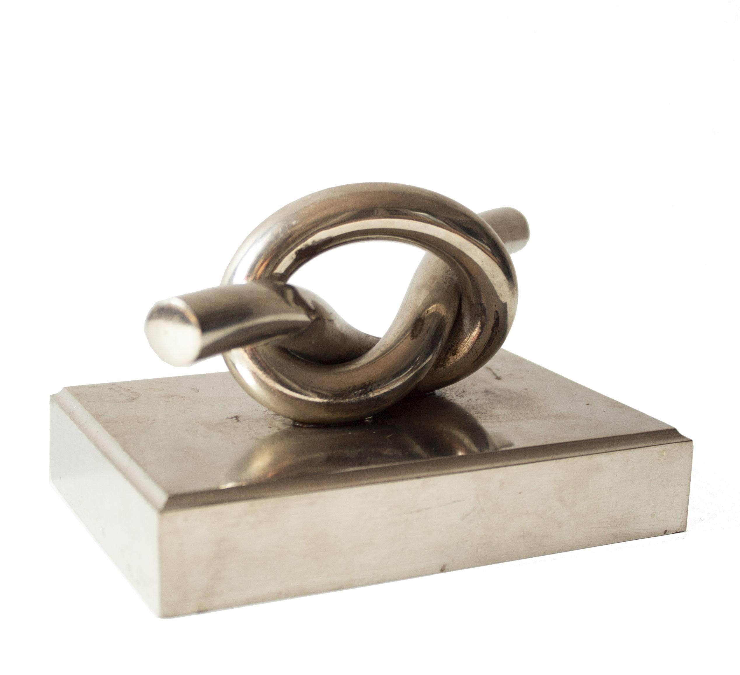 Knot Modernist Paperweight/sculpture in stainless steel and lead. Vintage sculpture from the 1970s on your desk to impress.