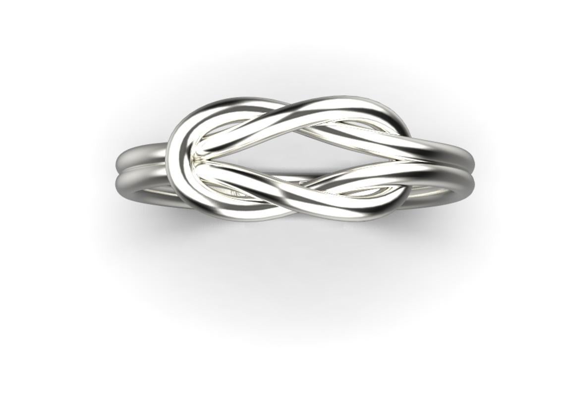 The Knot Ring embodies love and interconnection for that allure. Can be worn on its own or layered to create the ultimate ring stack. Officially Hallmarked at the Assay Office, UK.

Also available in other ring sizes (see image). Please indicate the