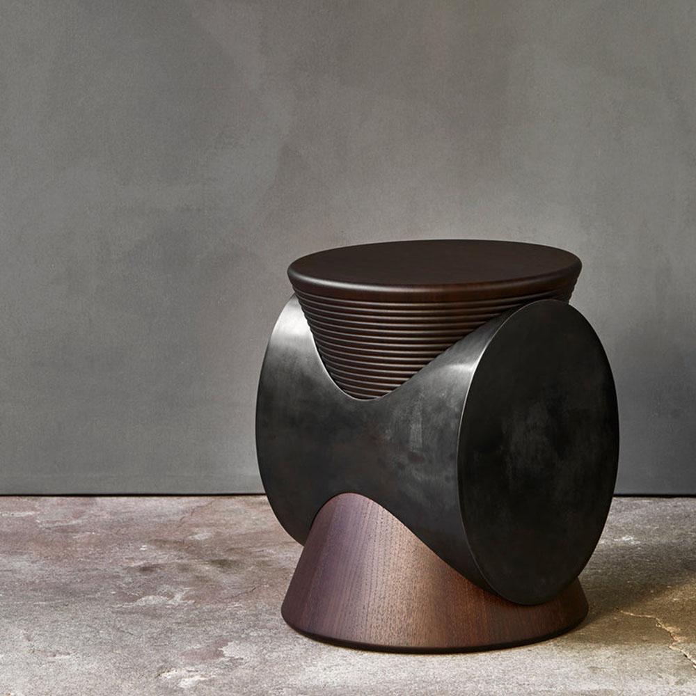 An exceptional side table and unique design by Dan Yeffet, made from carved walnut and patinated bronze
Dan Yeffet Studied Industrial Design, his work stretches from space to objects - and everything in between - and in various methods, from classic