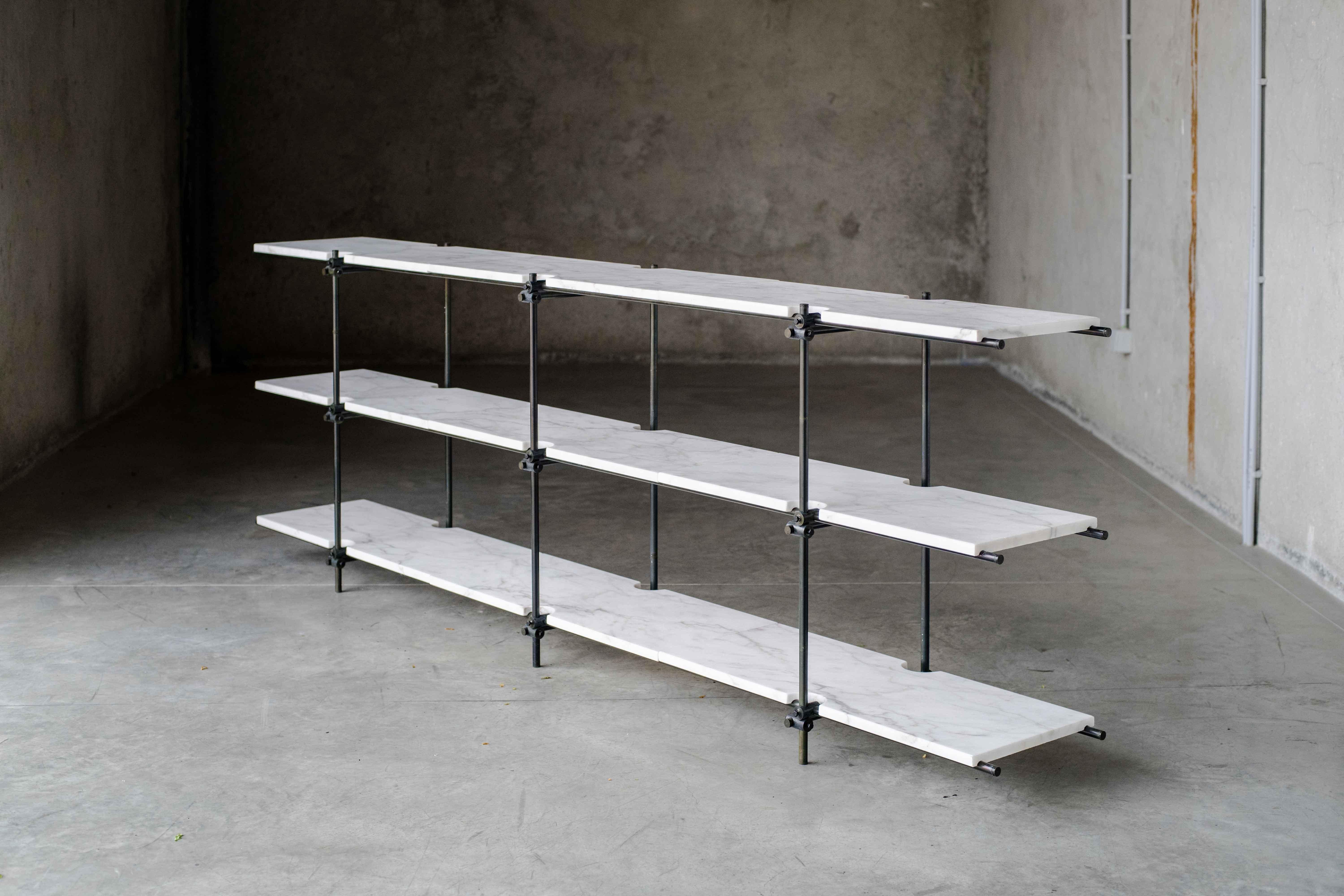 Knots and Tubes sideboard by MOB 
Limited editions of 15 + 1 prototype
Designer: Boris Gusic and Lucio Crignola (Switzerland)
Dimensions: h 82 x d 32 x w 245 cm
Material: Carbon steel tubes and connectors, Estremoz white marble

'Knots and