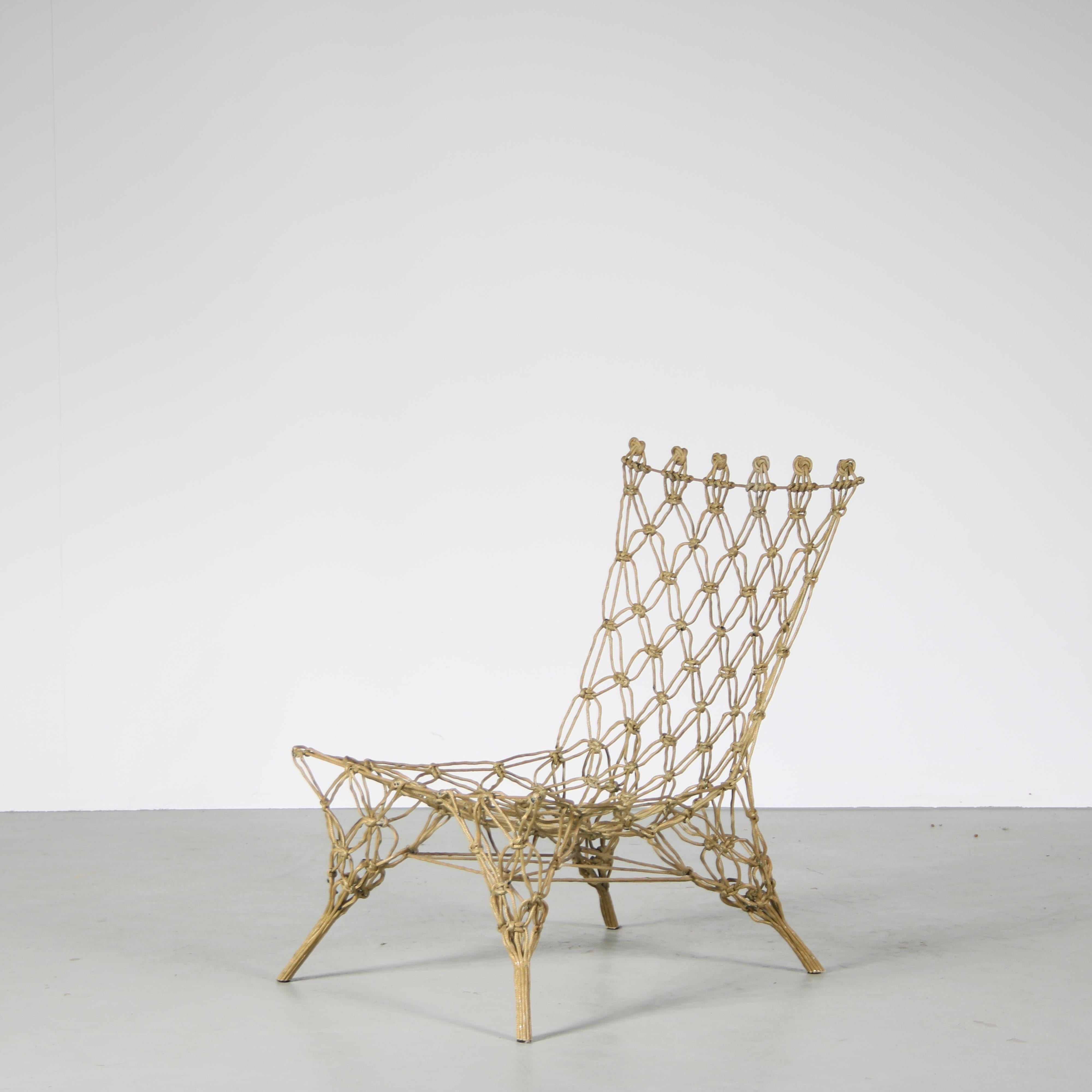 An eye-catching “Knotted” chair designed by Marcel Wander, manufactured by Droog Design in the Netherlands around 1990.

Made of high quality braided cord around a carbon fibre base, this unique piece has a truly outstanding appearence that will