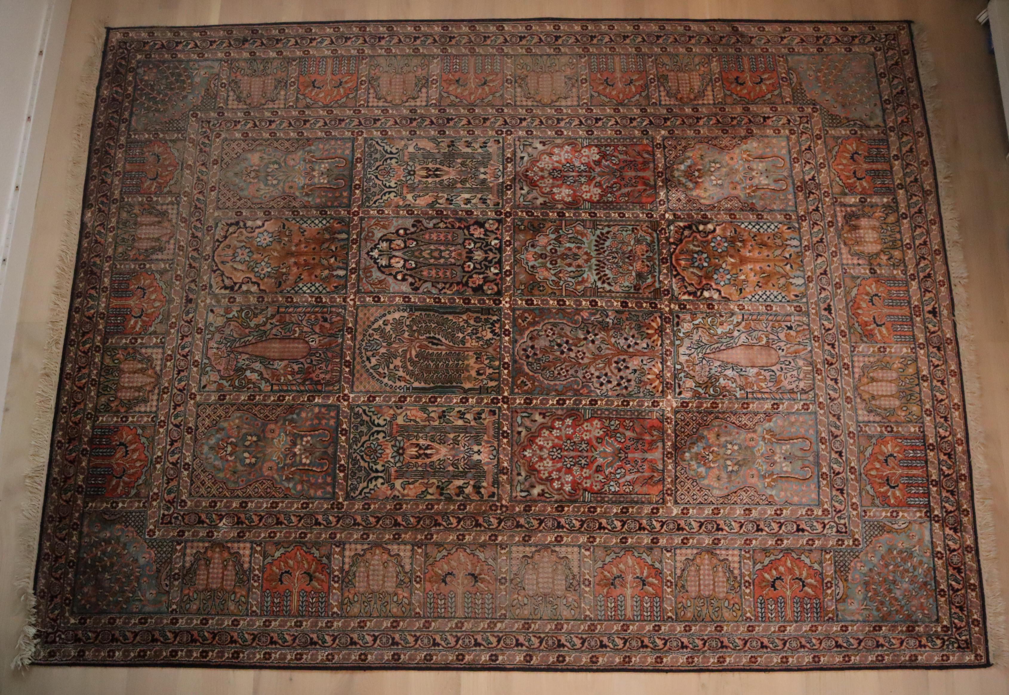 Finely Knotted Indian Silk Rug with Animal Motifs and Flowers from Hamadan.
This hand-knotted Indian quality carpet is real luxury under your feet, pampering and flattering. The high-quality workmanship is evidence of durability and makes the