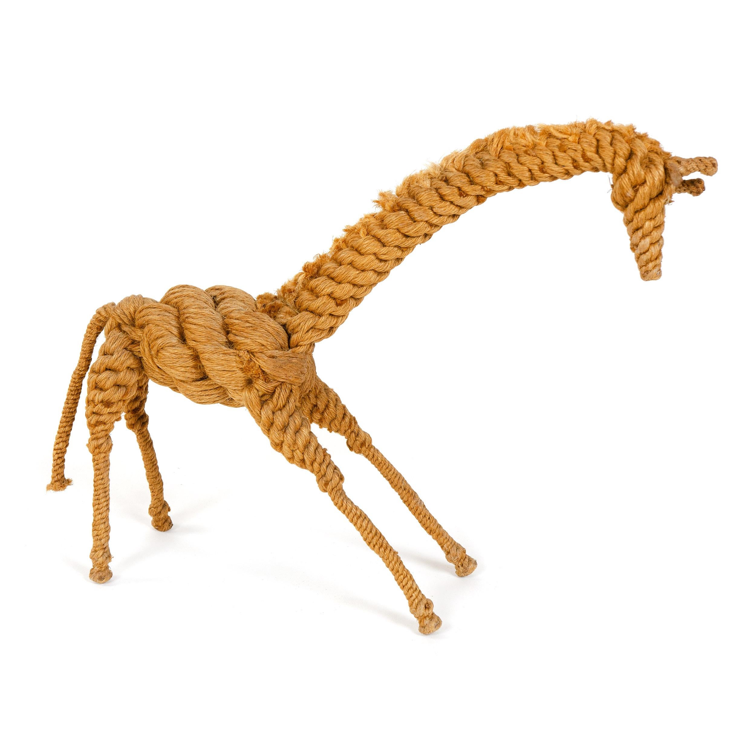 A small giraffe sculpture made from hand knotted and tied rope. Designed by Kay Bojesen and produced by Jorgen Bloch in Denmark, circa 1960s.