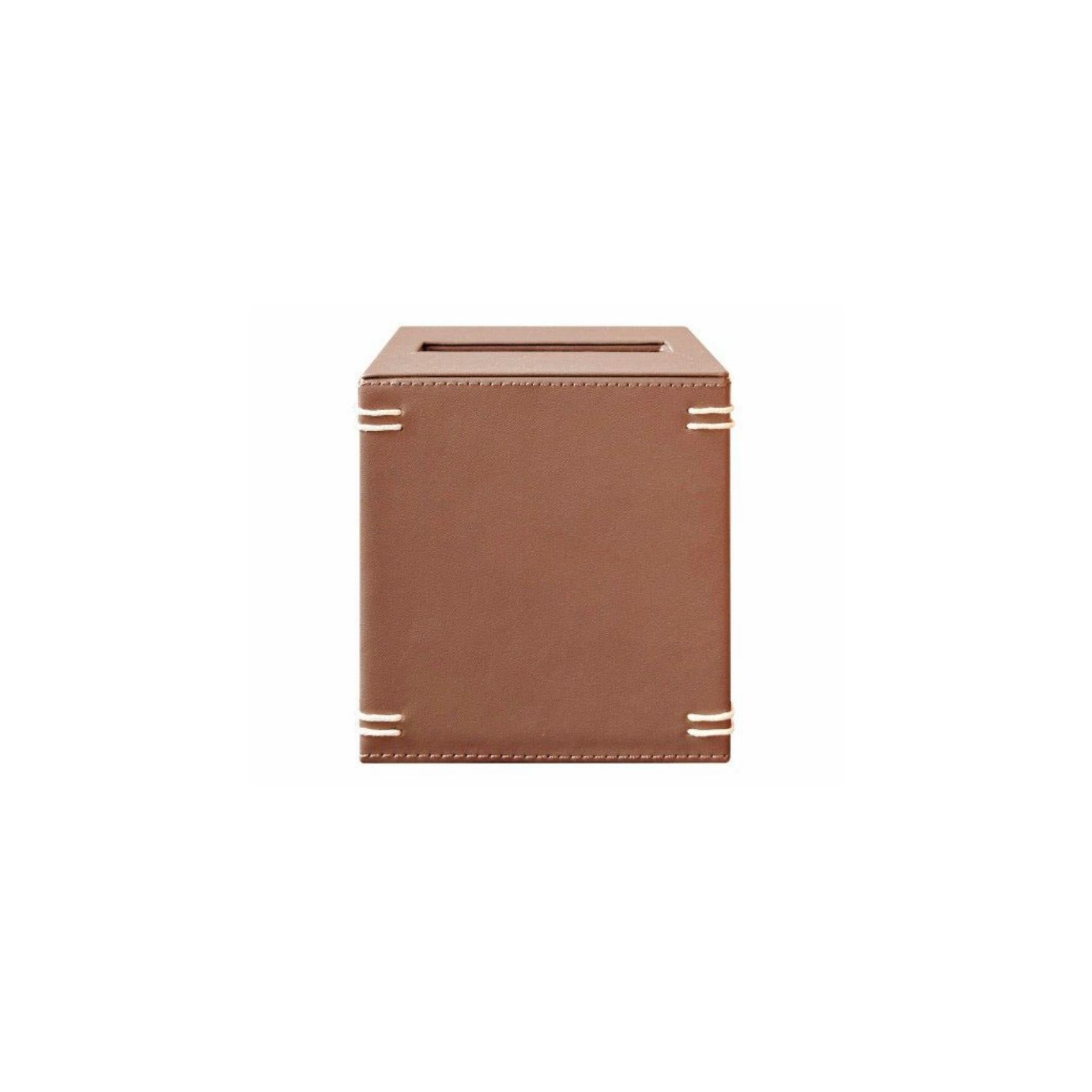 Description: Tissue box
Color: Caramel
Size: 14 x 14 x 15 H cm
Material: PU
Collection: Knotted.