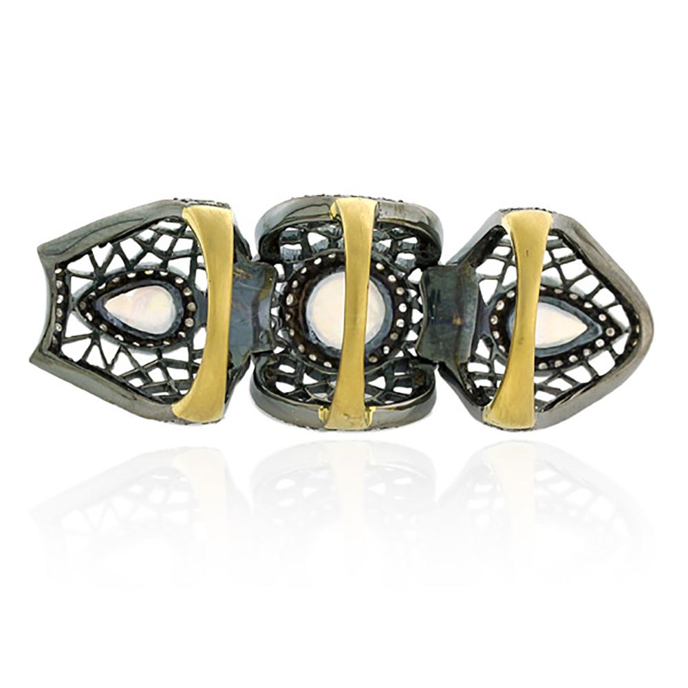 Modern Knuckle Ring with Moonstones Surrounded by Pave Diamonds Made in Gold & Silver For Sale