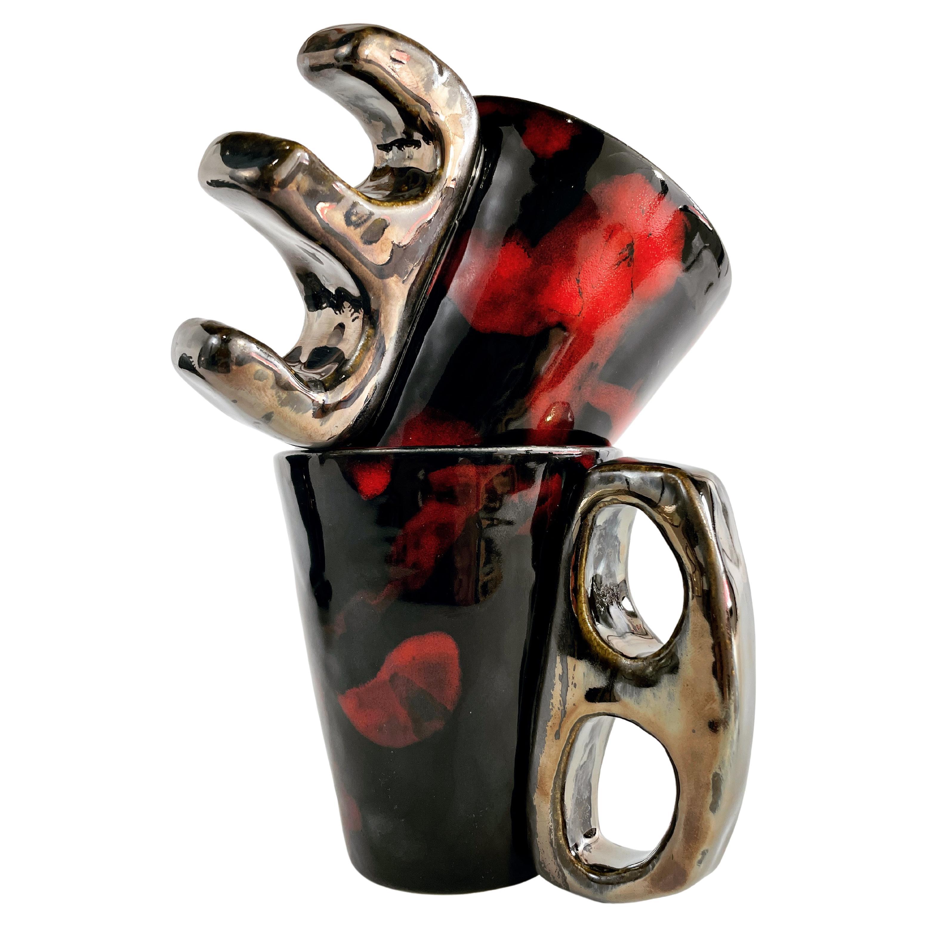 The Knuckler Three Finger V, shown here in Diffused China Red/Raven and Broken Silver, the food safe vessel for your favorite beverage of choice, entertaining, or as a decorative object or object d'art. Versatile, sustainable and one of kind, made