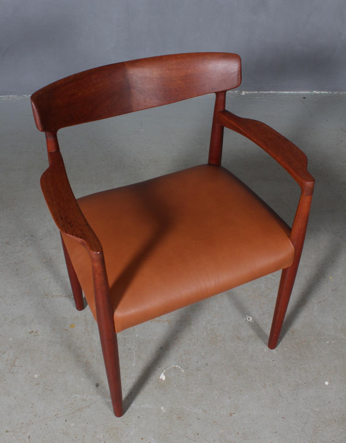Knud Færch armchair in teak.

New upholstered with aniline leather.

Made by Slagelse Møbelværk.