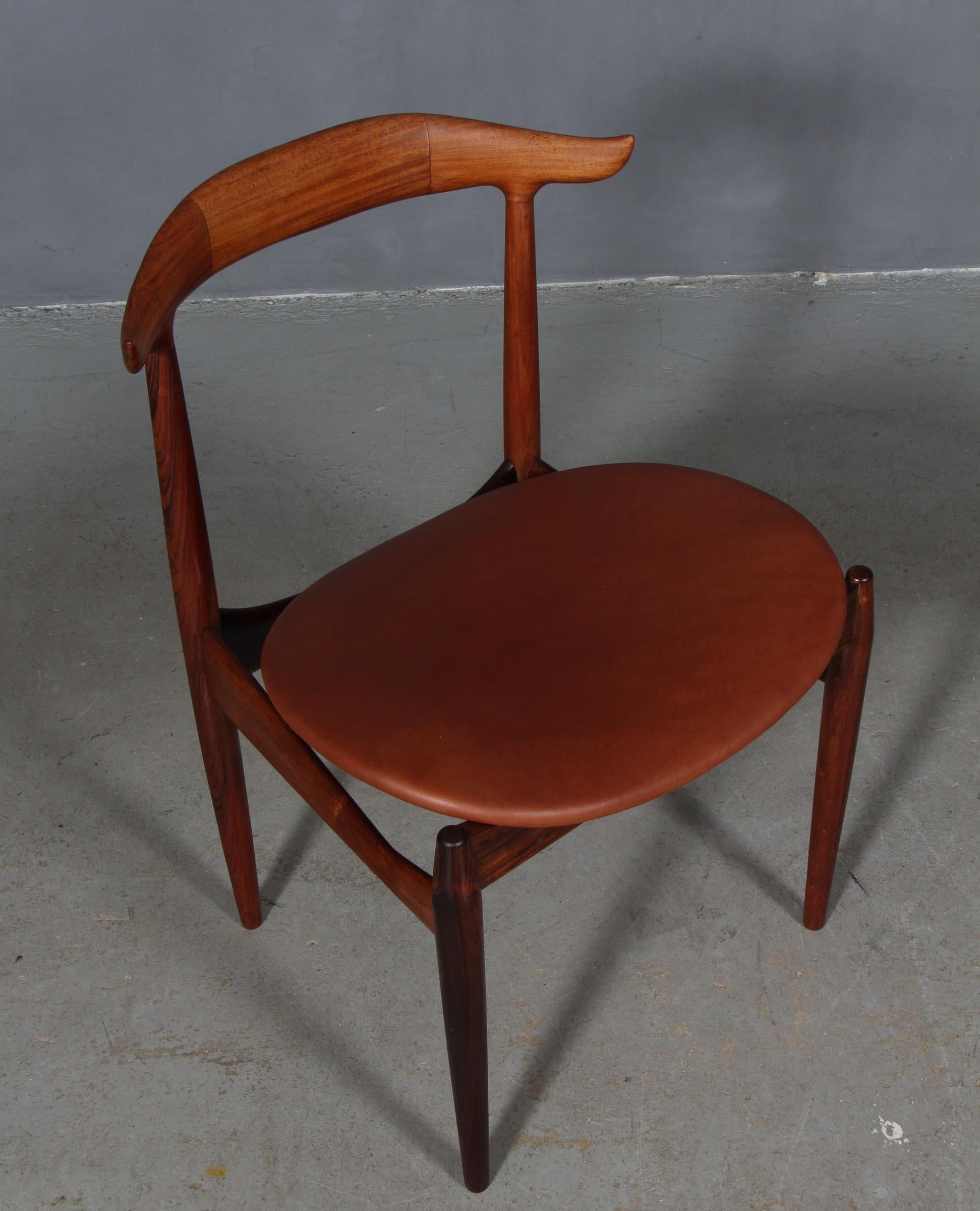Knud Færch cowhorn arm chair in solid rosewood. 

New upholstered with aniline leather.

Model 215 by Slagelse Møbelværk.