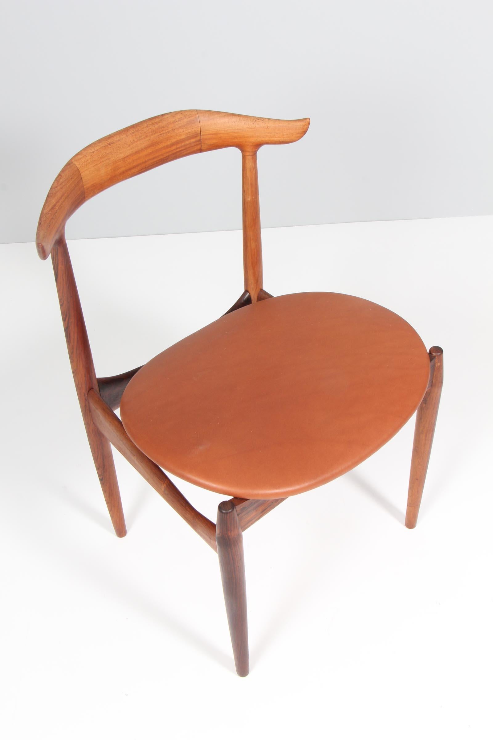 Knud Færch cowhorn arm chair in solid rosewood. 

New upholstered with aniline leather.

Model 215 by Slagelse Møbelværk.