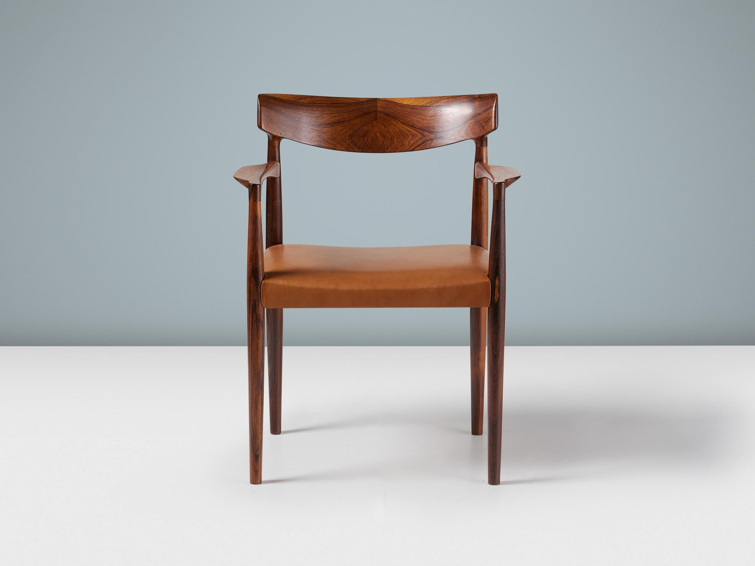 Knud Faerch - Model 343 Armchair

Produced in the early 1960s by renowned cabinetmakers Slagelse Mobelvaerk in Slagelse, Denmark. The Model 343 armchair is part of a series with the more widely available 343 dining chair. The arm chairs were made in