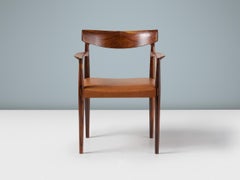 Poltrona Knud Faerch in palissandro con seduta in pelle anni '60