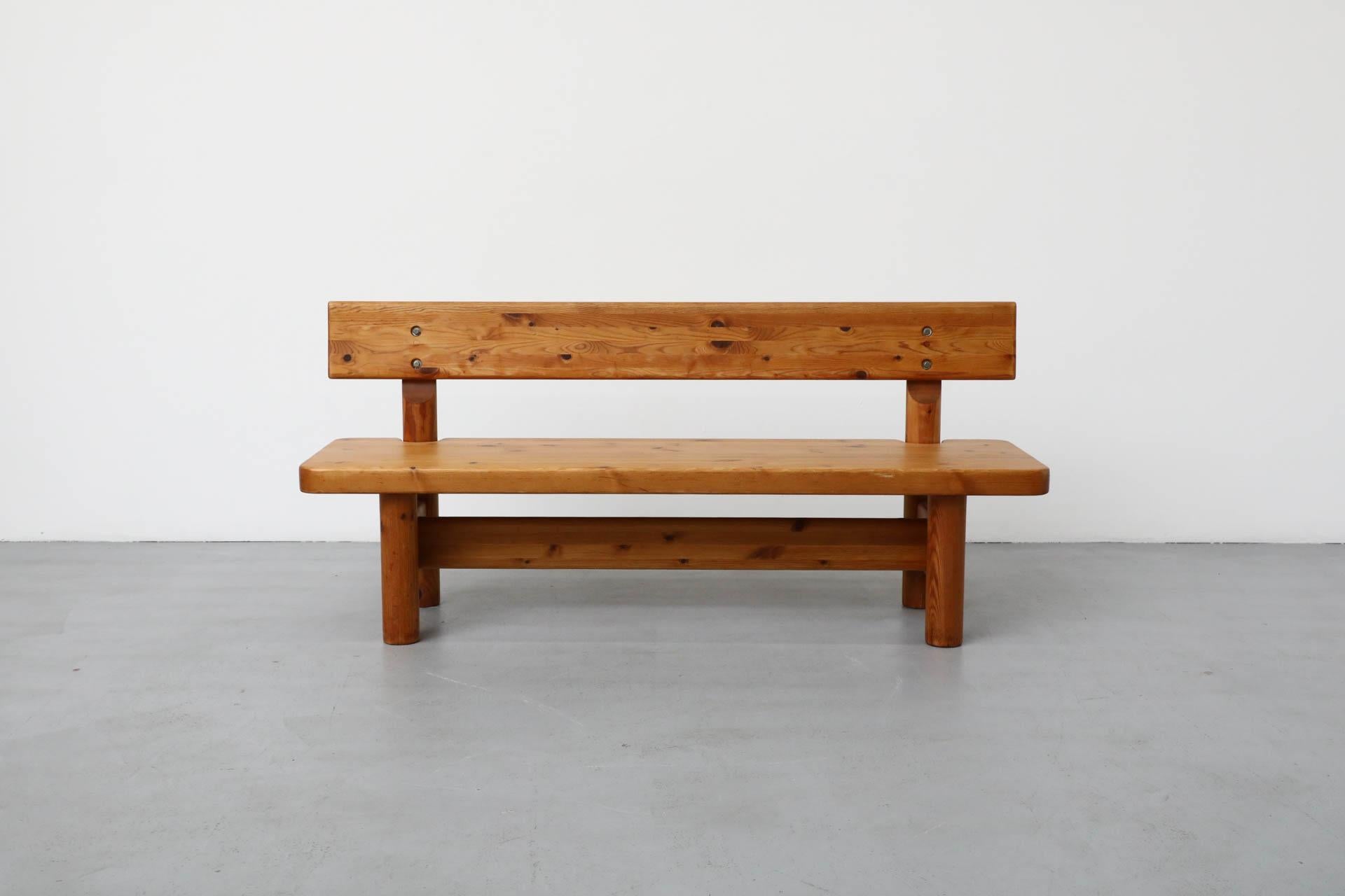 Solid, Danish Mid-Century pine bench designed by Denmark's architectural duo Knu Friis and Elmar Moltke Nielsen. Friis & Moltke Denmark created this design around 1960 for their own studio. The studio was founded in 1954 and played a key role in