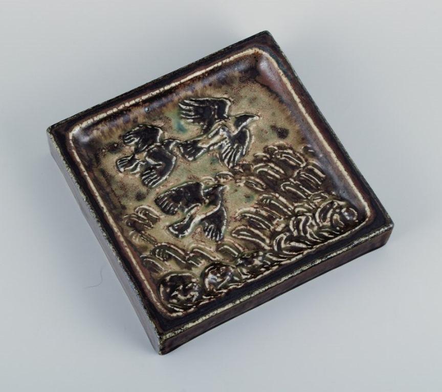 Knud Kyhn for Royal Copehagen.
Wall relief in stoneware with a motif of birds in a landscape.
Model number 22056.
First factory quality.
In perfect condition.
Marked.
Mål: D 18.0 x H 3.5 cm.