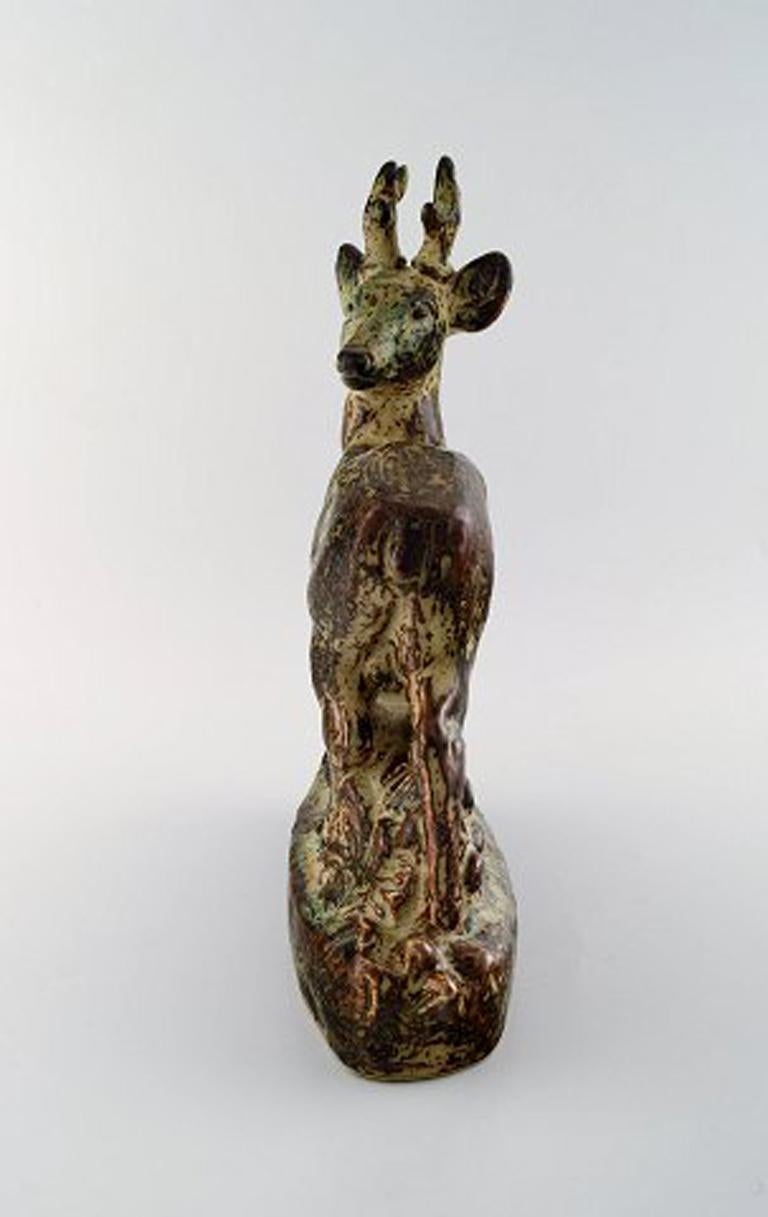 Knud Kyhn for Royal Copenhagen. Very large stoneware figure no. 21333, standing deer.
Measures: 39 x 29 cm.
1st factory quality.
In perfect condition.