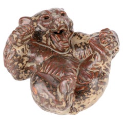 Knud Kyhn Royal Copenhagen Oso de porcelana tumbado grande esmaltado Sung