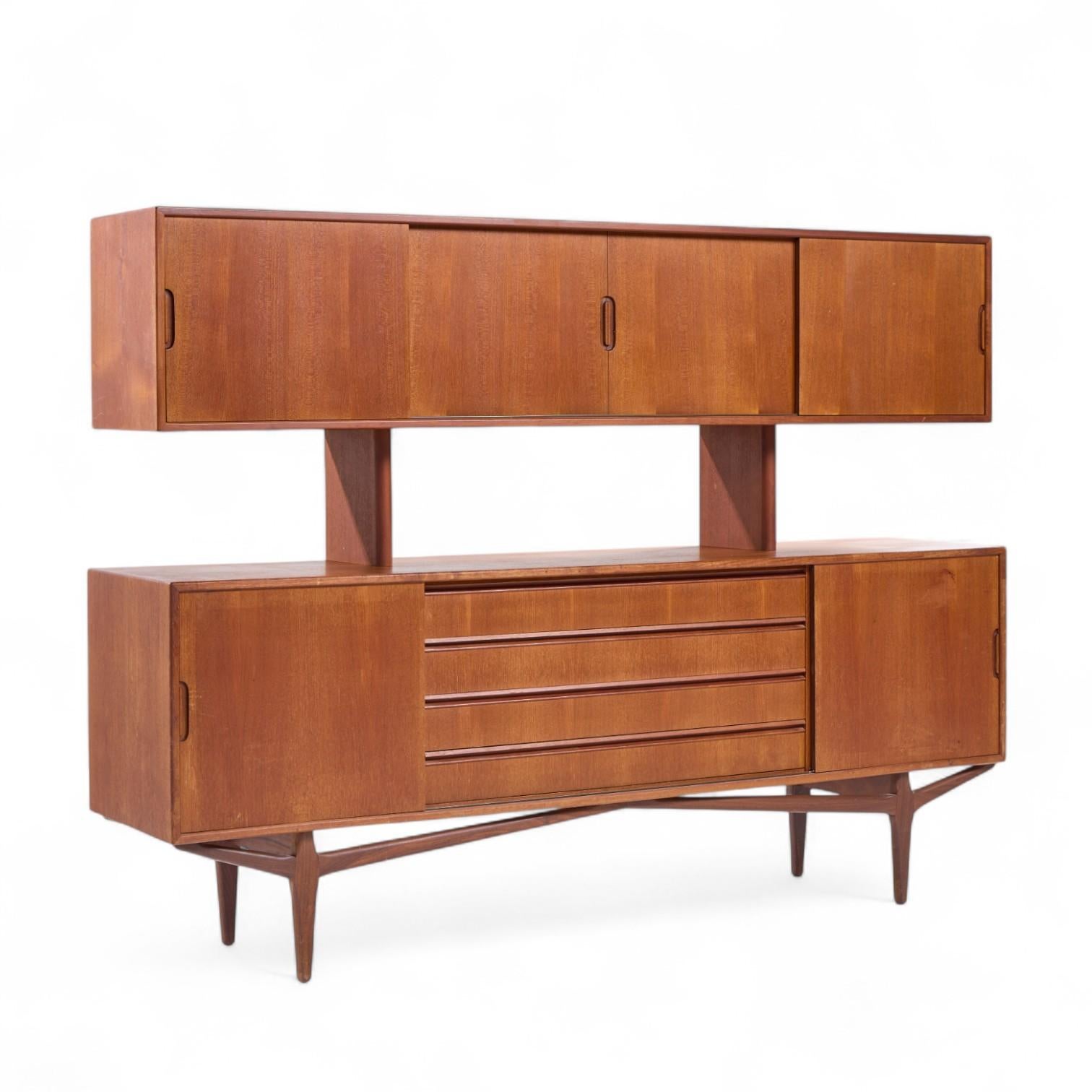 Knud Nielsen Mid Century Danish Teak Credenza and Hutch

The credenza measures: 78.5 wide x 18 deep x 31 inches high
The hutch measures: 78.5 wide x 14.75 deep x 27.75 inches high
The combined height of the credenza and hutch is 58.75 inches

Good