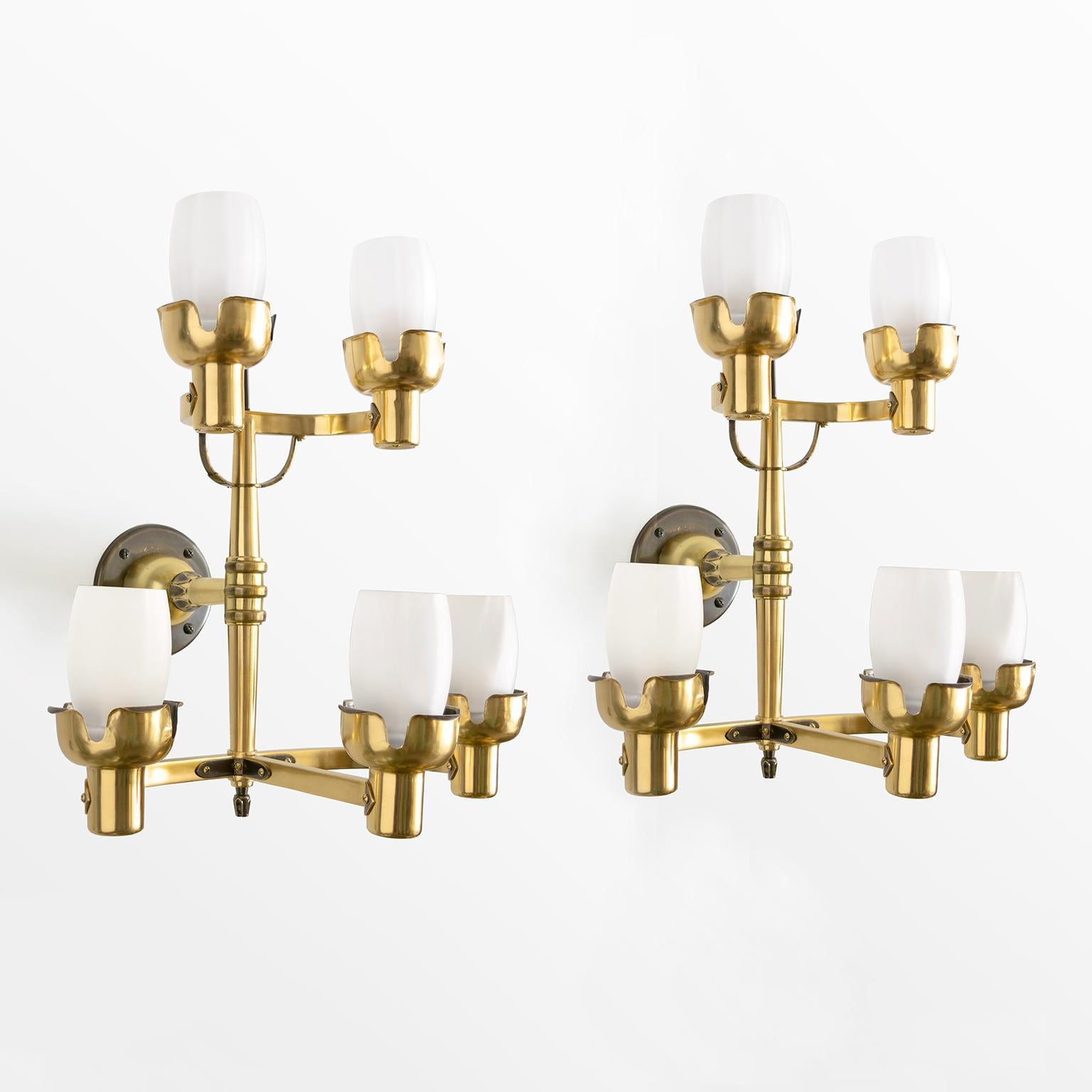 Pair of large Scandinavian Modern polished and patinated brass 5-arm sconces designed (signed) by Knut Hallgren. Made by Bohlmarks AB, Stockholm, Sweden circa 1940’s. Newly restored and rewired for use in the USA with standard Edison base