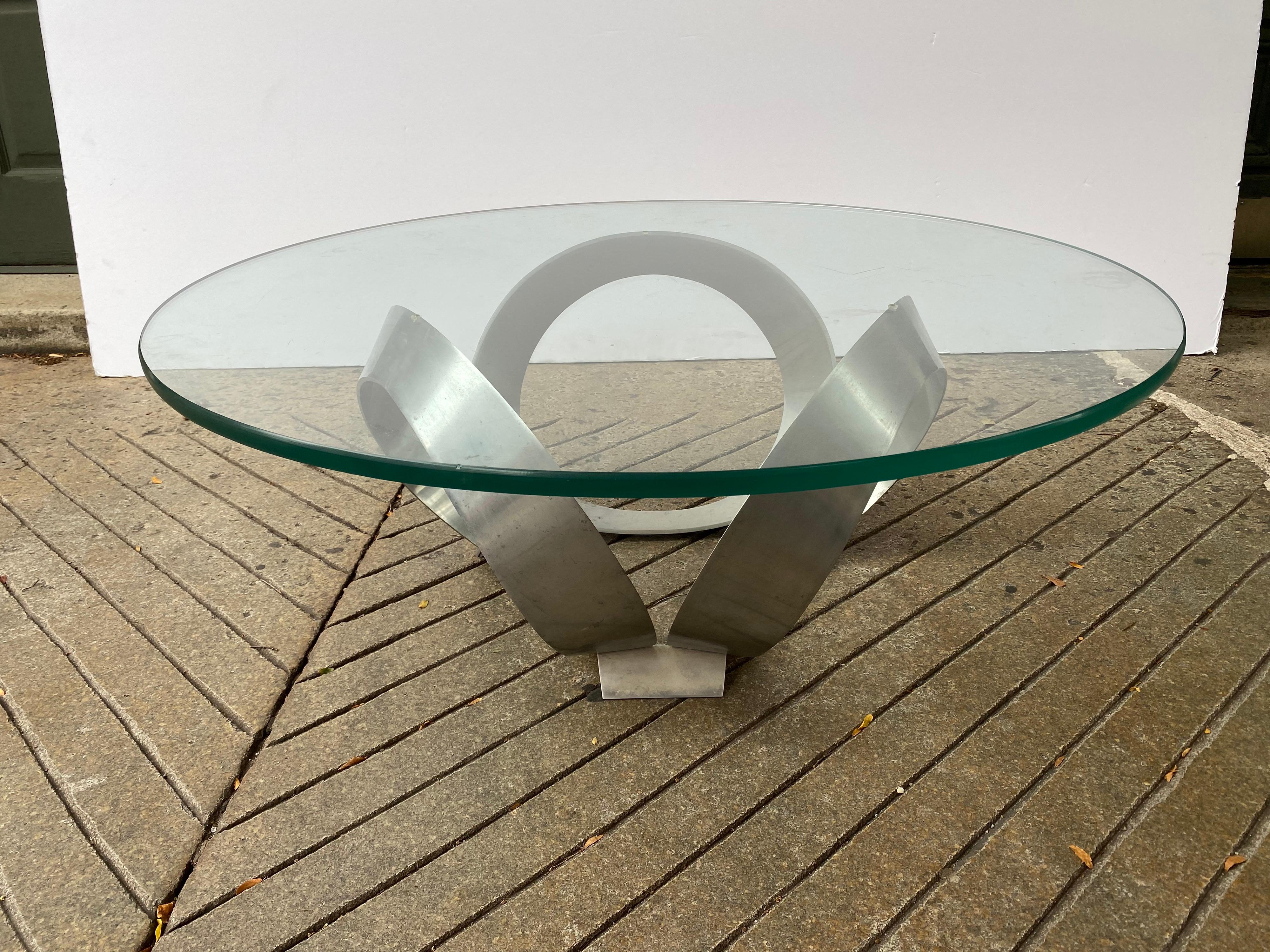 Knut Hesterberg 1970's aluminum and glass round coffee table. 3 substantial aluminum rings hold up a 43