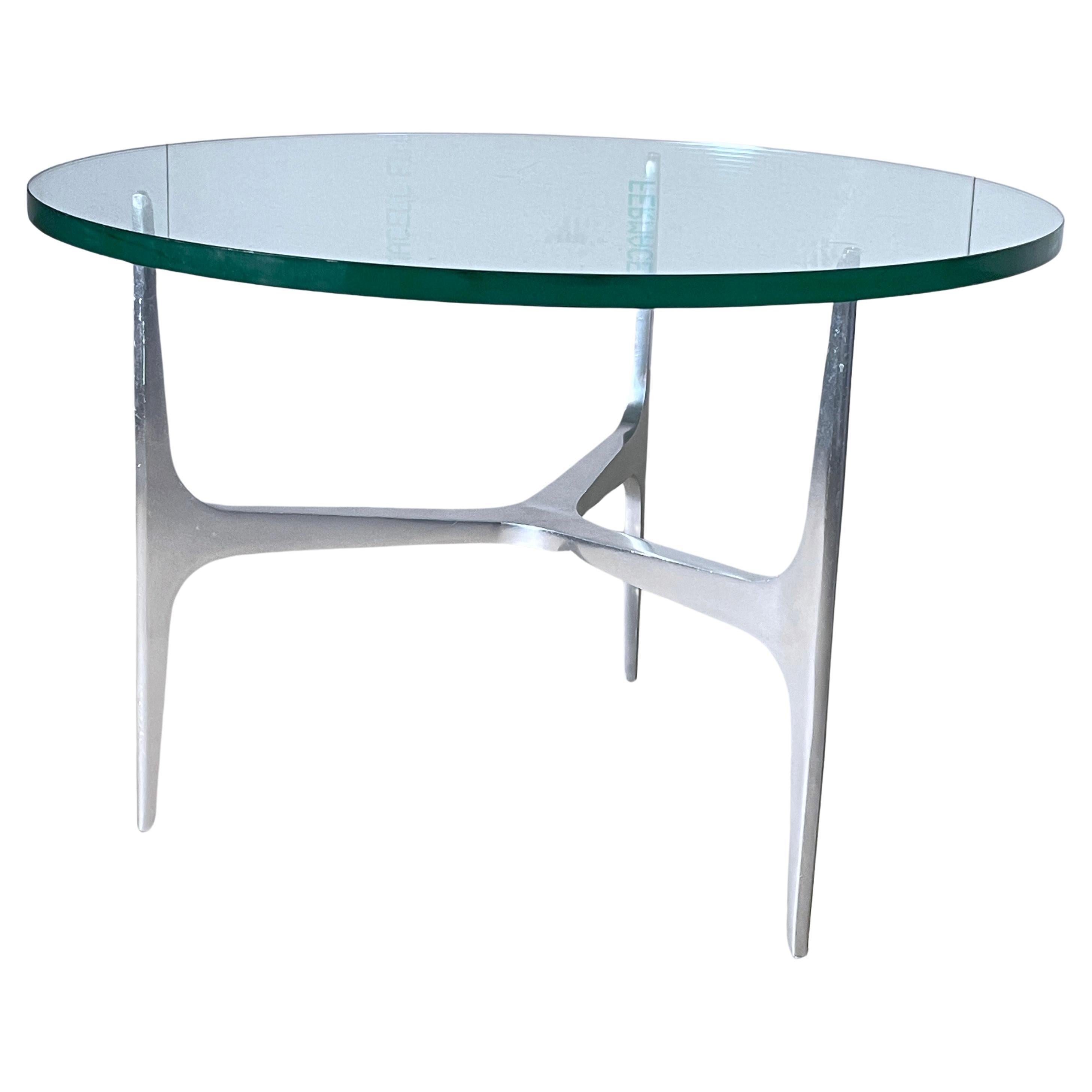 1960’s Space Age Coffee / Couch Table By Knut Hesterberg for Ronald Schmitt. Reinforced glass tabletop with aluminium base
Designer: Knut Hesterberg
Producer: Ronald Schmitt
Measurements: Diameter: 70cm  Height: 46.5cm
Condition: Very good with
