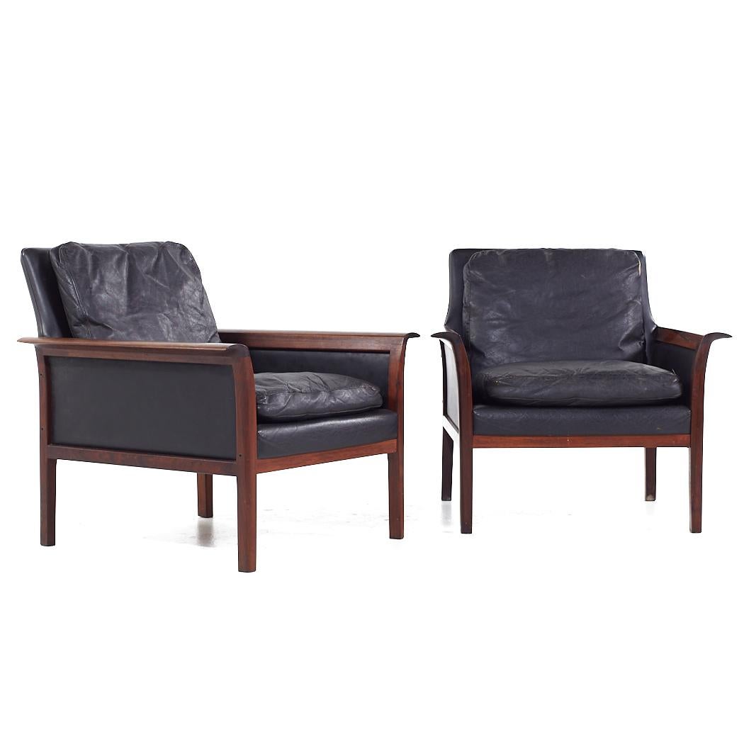 Knut Sæter for Vatne Møbler Mid Century Norway Rosewood Lounge Chairs - Pair

Each lounge chair measures: 30 wide x 29.5 deep x 28.5 high, with a seat height of 16 and arm height/chair clearance 20.25 inches

All pieces of furniture can be had in