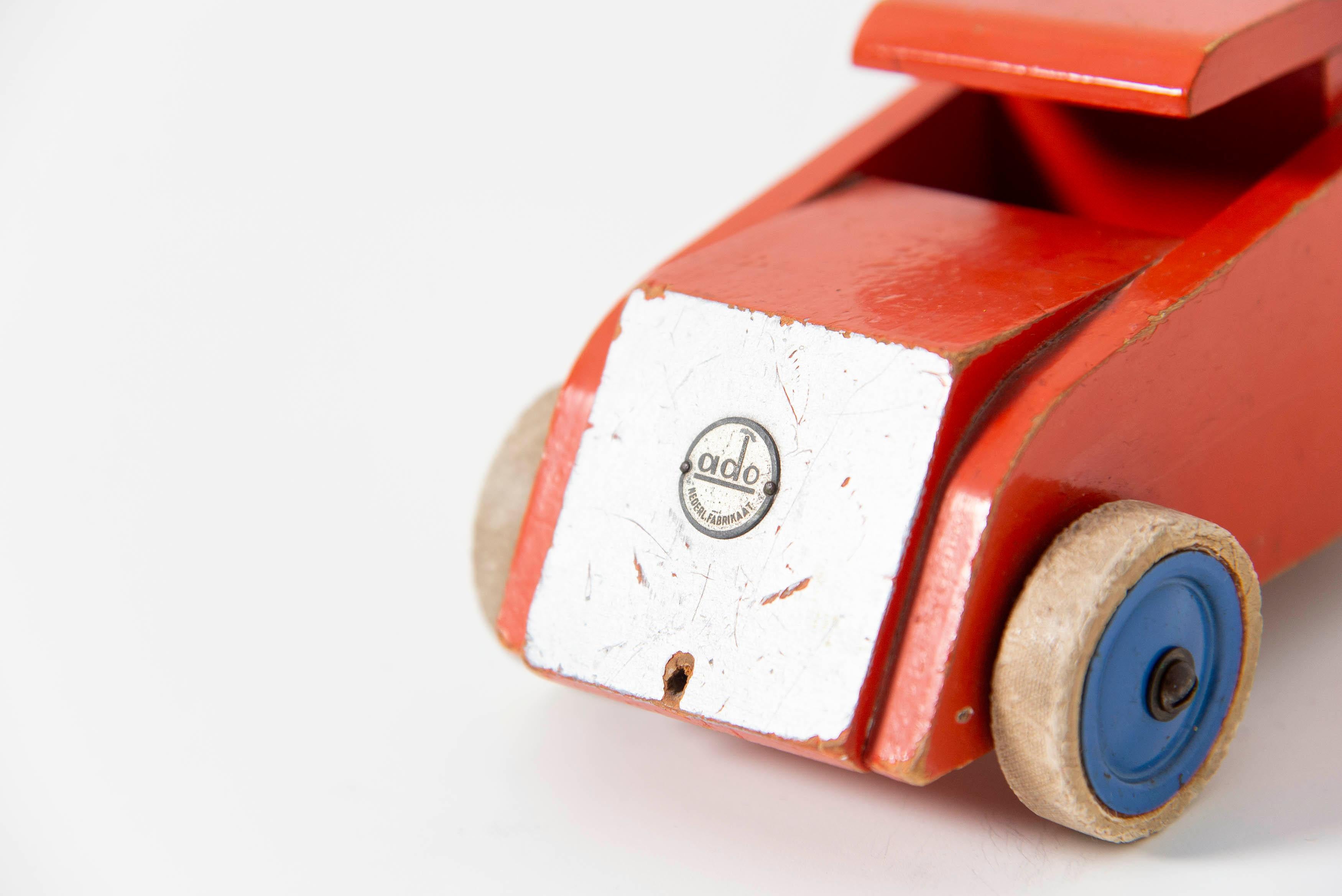 Rare collectible toy small toy truck designed by Ko Verzuu for Ado Holland in 1950. Ado means Arbeid door onvolwaardigen, translated; labor by incapacitated, which makes this an even more special piece. Toys by Ado are being highly collected at the