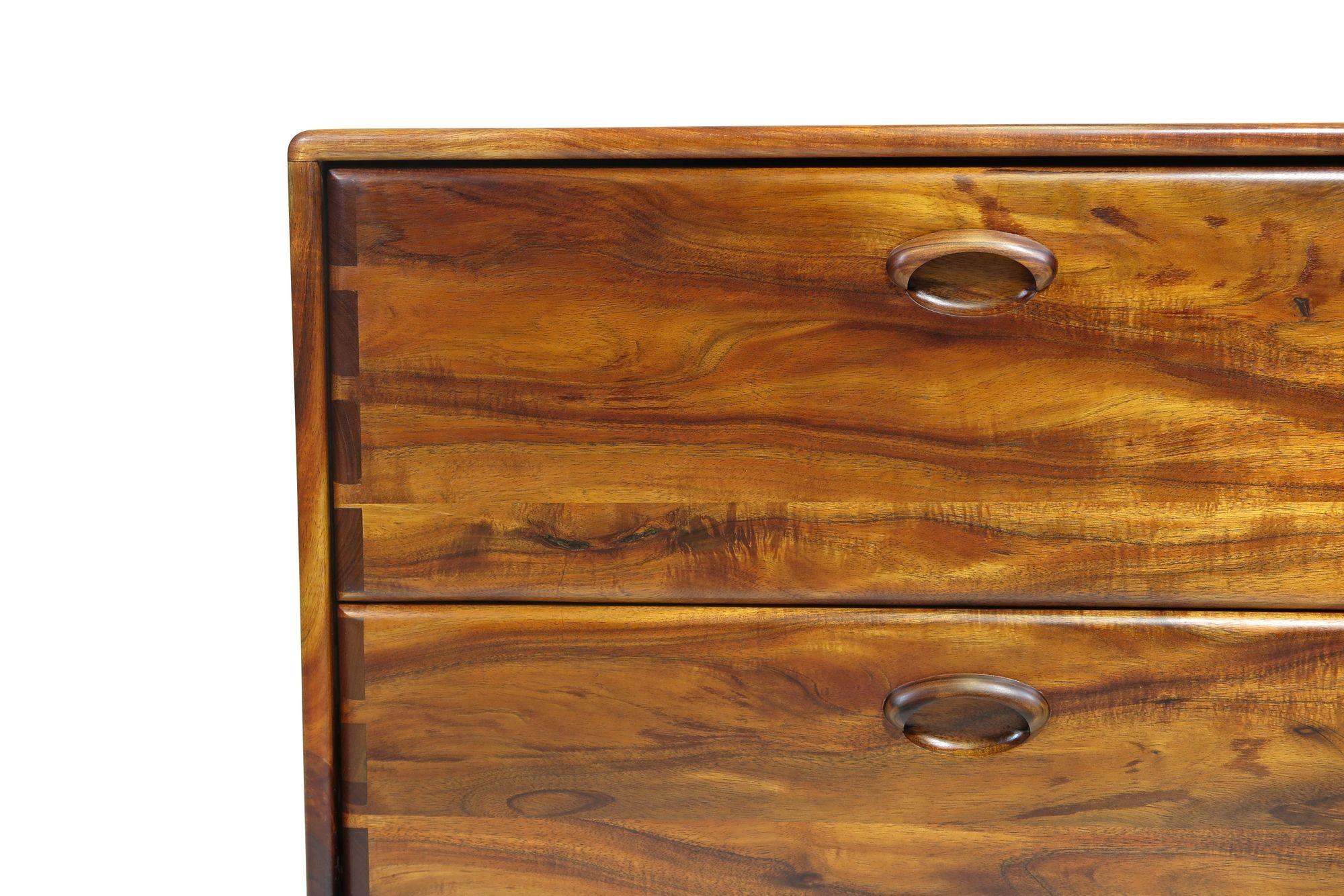 California studio craft filing cabinet designed by Jim Sweeney, Berkeley, circa 1983. The cabinet is handcrafted of solid Koa wood, and features two filing drawers with boldly exposed joinery on the cabinet and drawers. The cabinets have been