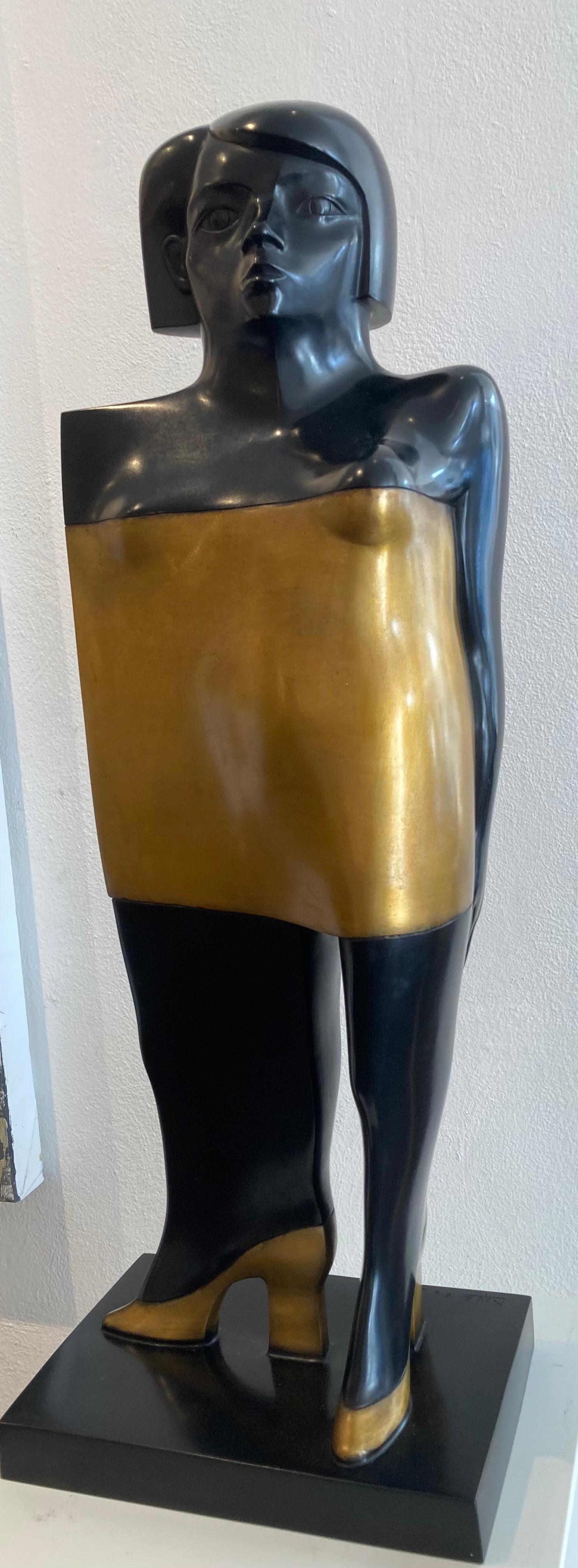 La Battona Standing Figure Female Bronze Sculpture
KOBE, pseudonym of Jacques Saelens, was a Belgian artist (Kortrijk, Belgium 1950 – Saint-Julien (Var), France 2014).

He combined the broad with sophistication. Two themes dominated his artworks: