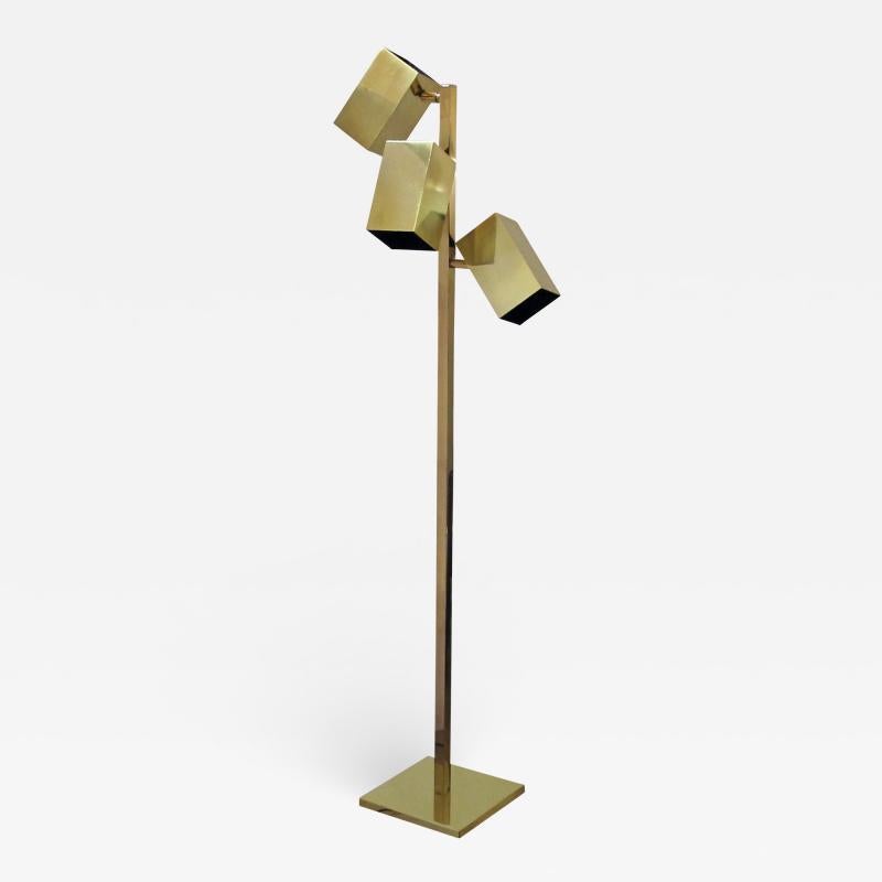 Koch & Lowy articulating 3 head brass floor lamp, 1970s.

Cool lamp that matches any decor and brings a modern flare. As shown in photos
Measures: Height 59 in. (149.86 cm)
Width 10 in. (25.4 cm)
Depth 10 in. (25.4 cm).
   