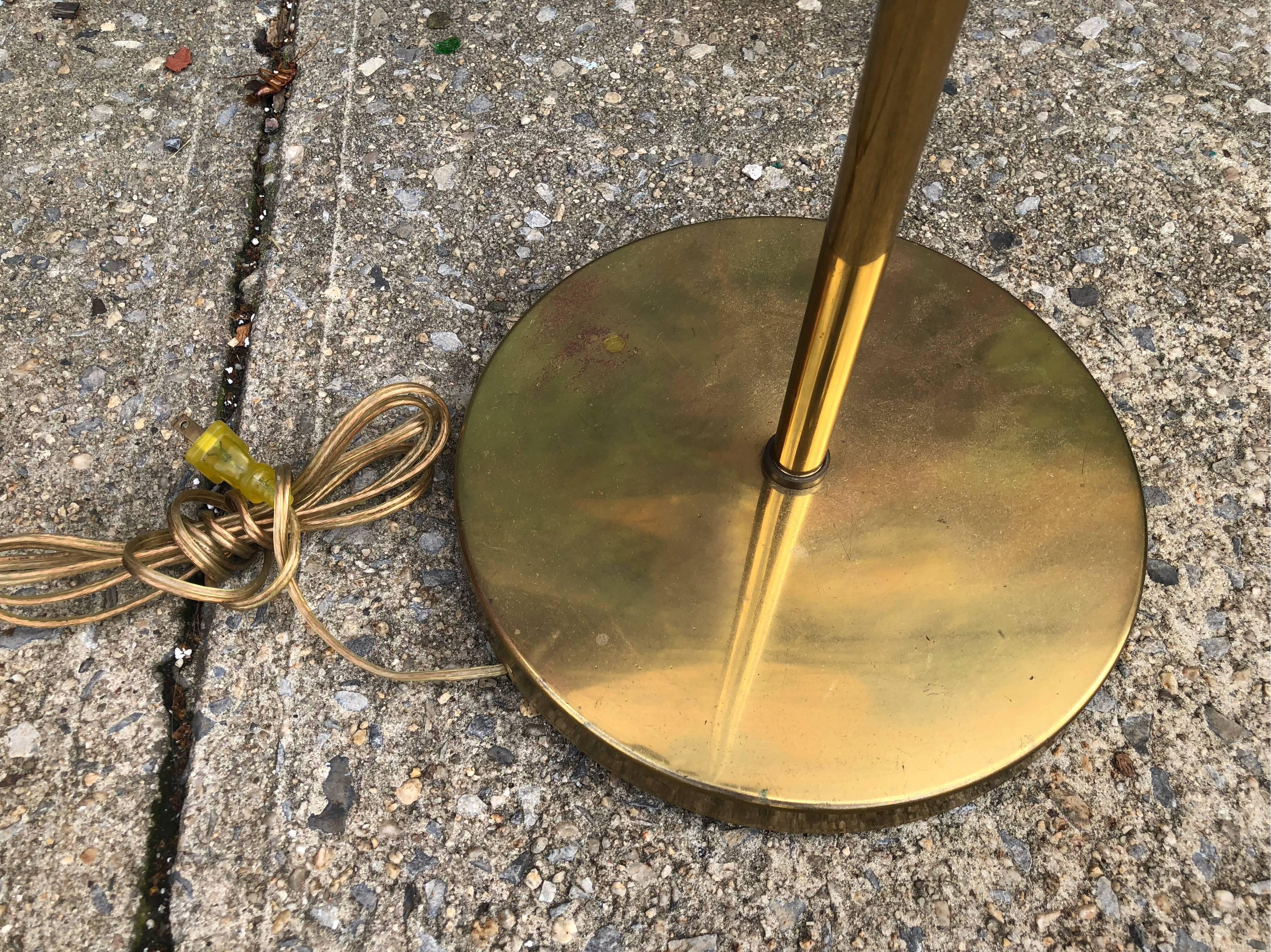 Gorgeous Koch and Lowy brass floor lamp. Incredible subtle patina. In original condition with no major wear. Functions perfectly. All heads pivot and swivel smoothly.