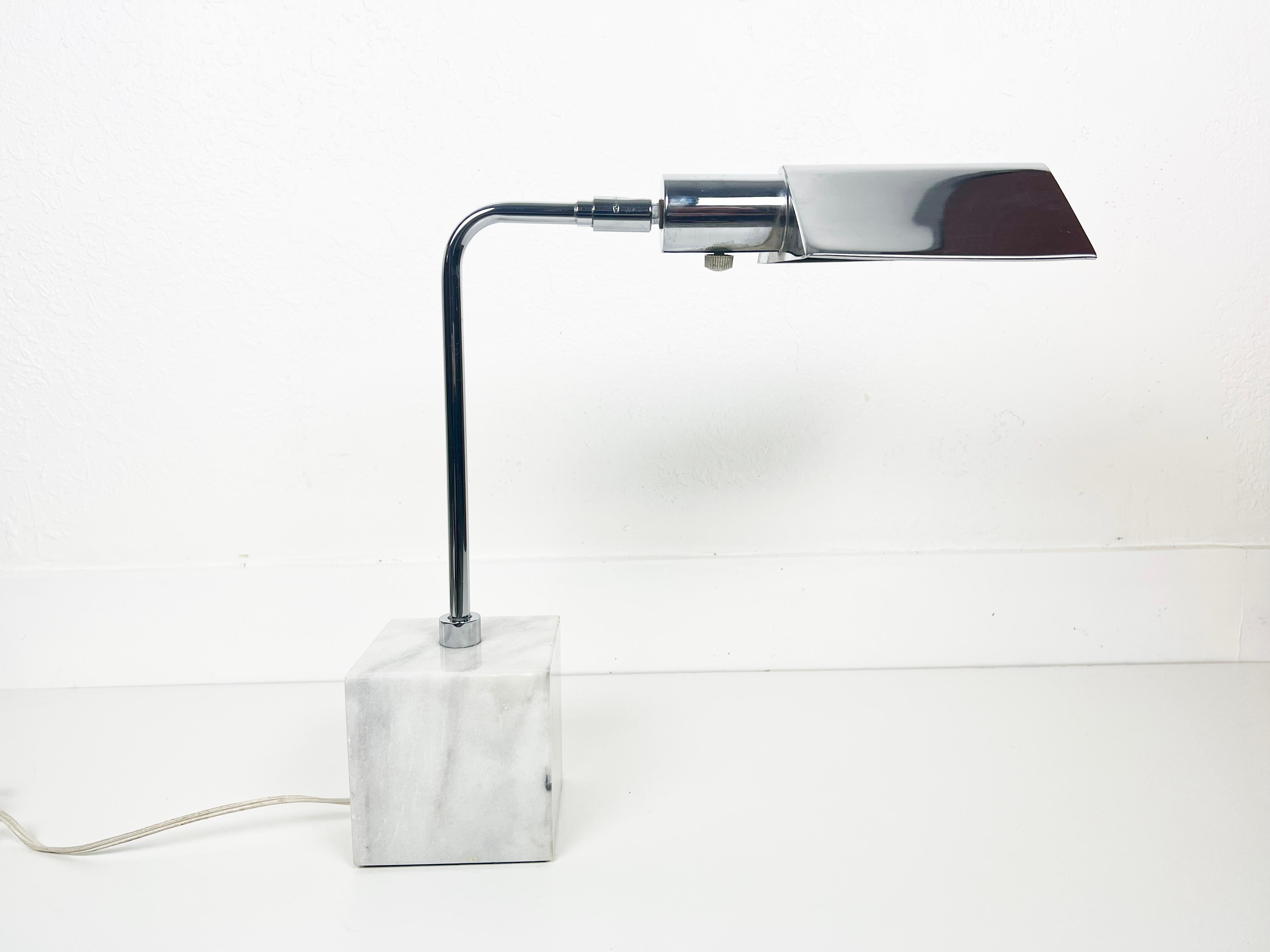 Vintage marble base chrome table lamp by Koch and Lowy with adjustable shade. Signed.

Manufacturer: Koch and Lowy

Year: 1960s

Style: Mid-Century Modern

Dimensions: 16