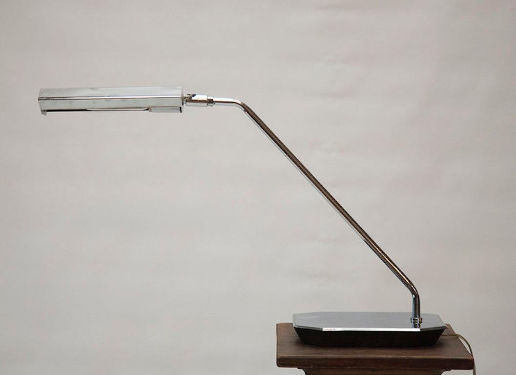 A rare articulating chrome task lamp by Koch and Lowy. 

Dimensions: 16