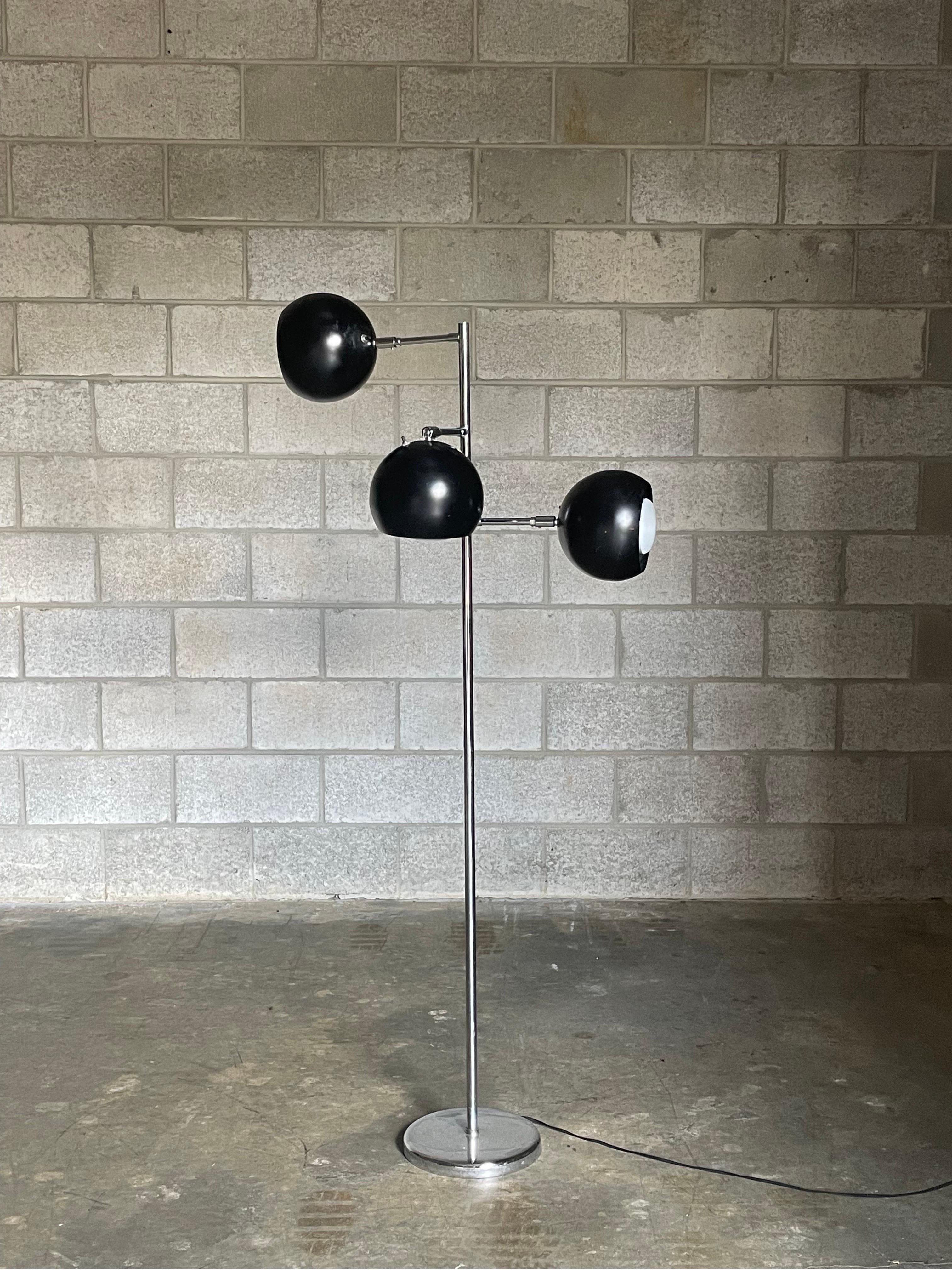 Mid-Century Modern floor lamp by Koch & Lowy. Features three 