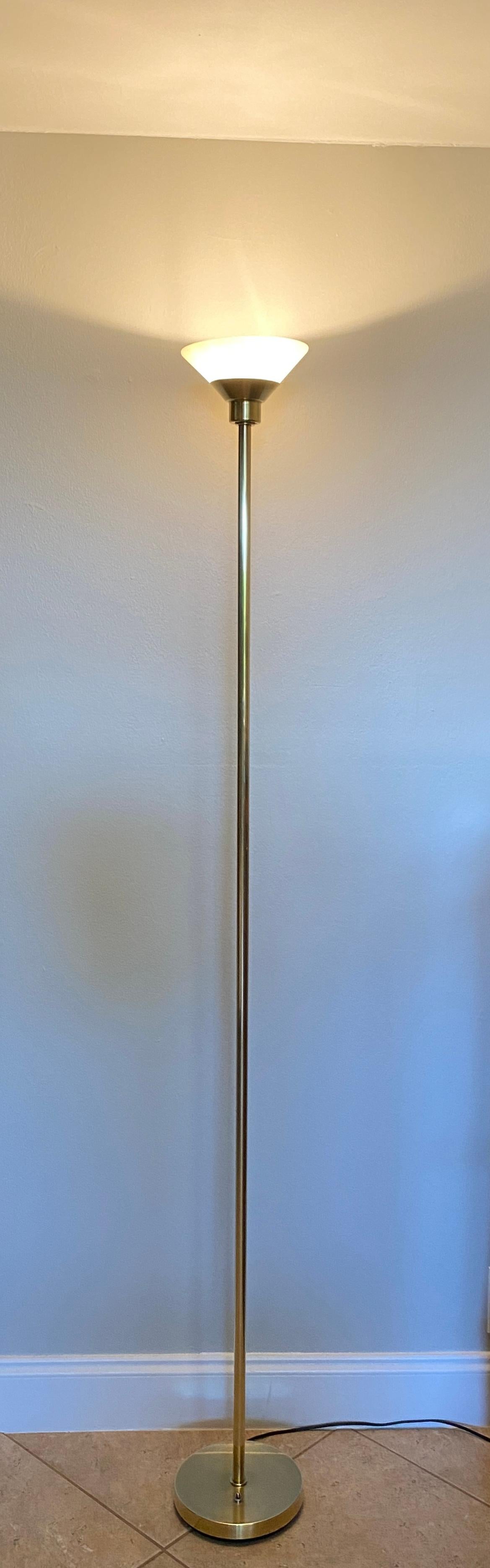 Iconic American made Koch and Lowy polished brass floor lamp. 

This Koch and Lowy floor lamp is absolutely beautiful, its minimal mid century design makes it suitable for any themed setting whether modern, contemporary, mid-century or traditional.
