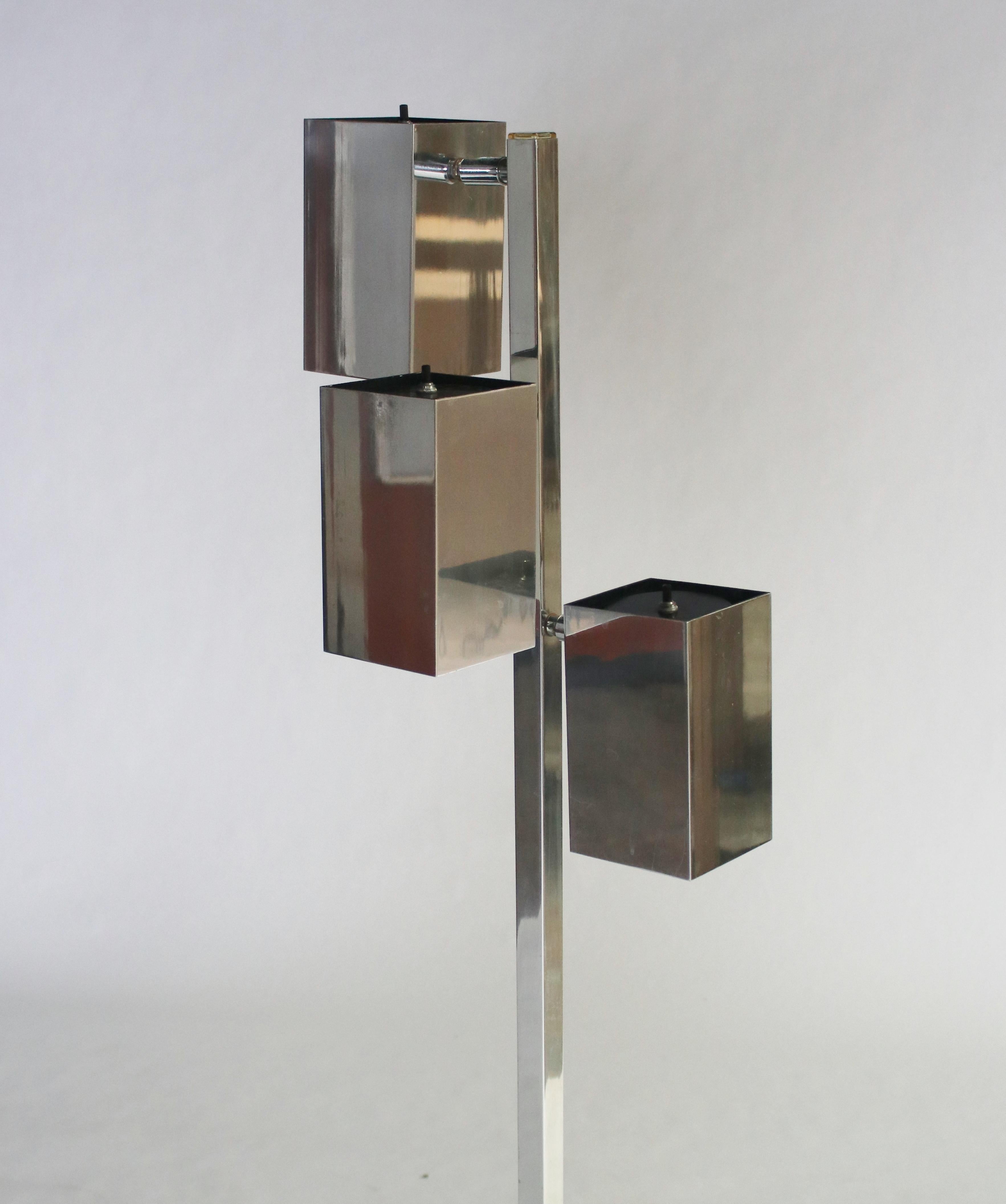 Mid-century modern 3-can chrome floor lamp by Koch and Lowy. Each cubist atriculated light can be adjusted into various positions. Wired and working.