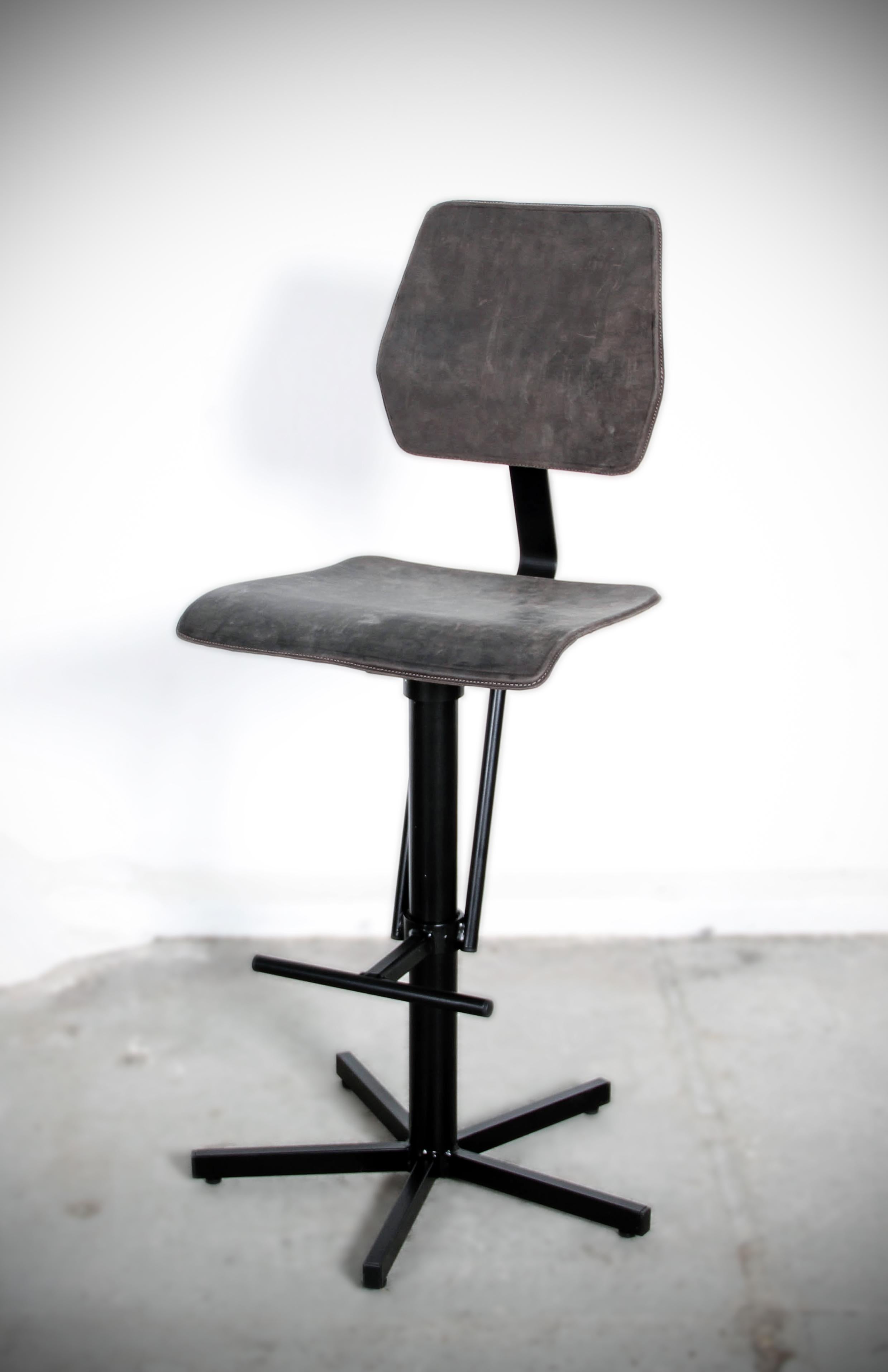 Kodak leather barstool by Jesse Sanderson
Artist: Jesse Sanderson
Material: Steel frame, Nubuck leather
Dimensions: 51 x 55 x 117 cm

Exploring antique markets, Jesse Sanderson got intrigued by a series of old factory chairs. They were made and