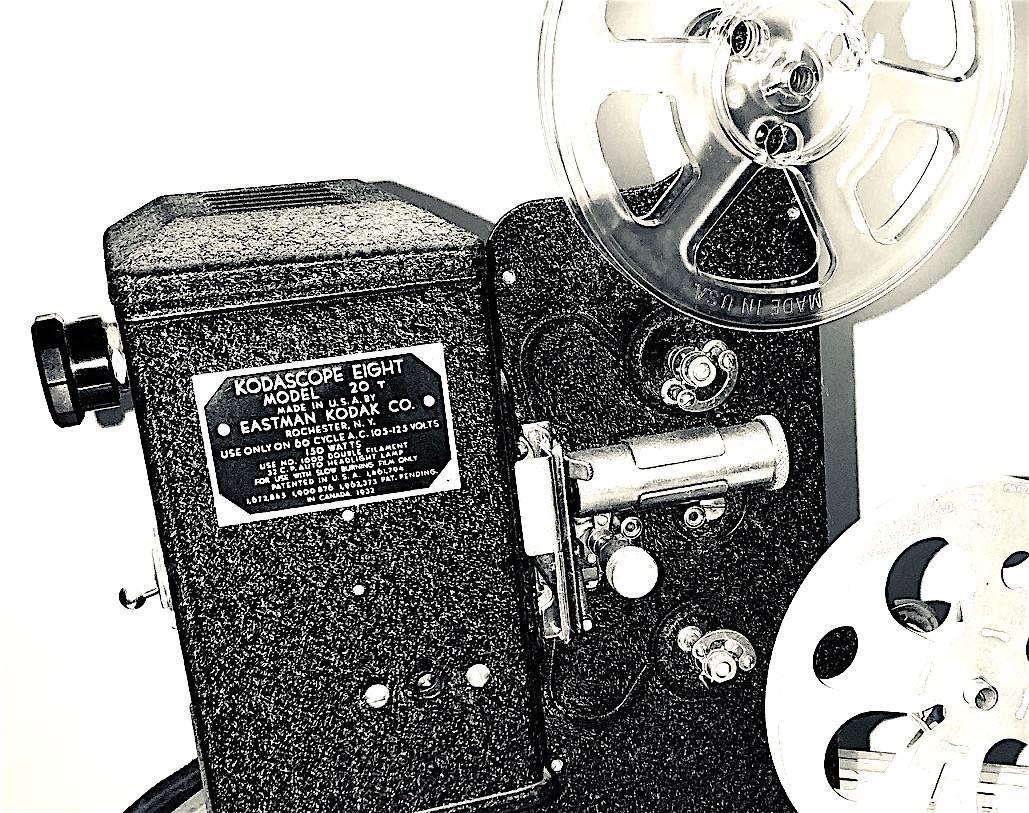 Offered for your approval is this circa 1934 Kodak KodaScope 8mm motion picture projector.
It is in the factory original paint finish, with original lens, innards and with two reels and actual 8mm film for display threading. This model 20T is a