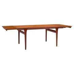 Kofod Larsen for Faarup Møbelfabrik Teak Hidden Leaf Expanding Dining Table