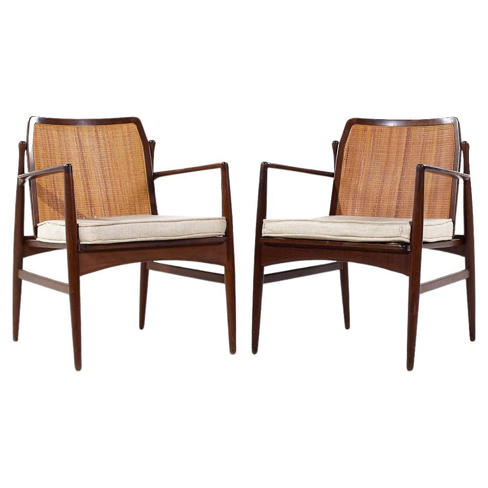 Kofod Larsen for Selig Mid Century Walnut and Cane Lounge Chairs - Pair